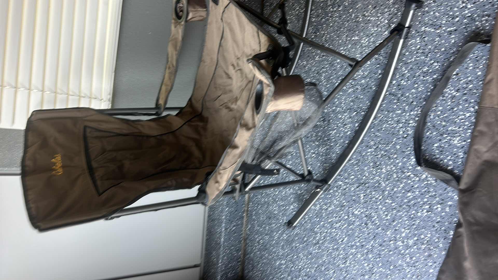 Photo 1 of CABELA'S FOLDABLE ROCKING CHAIR.