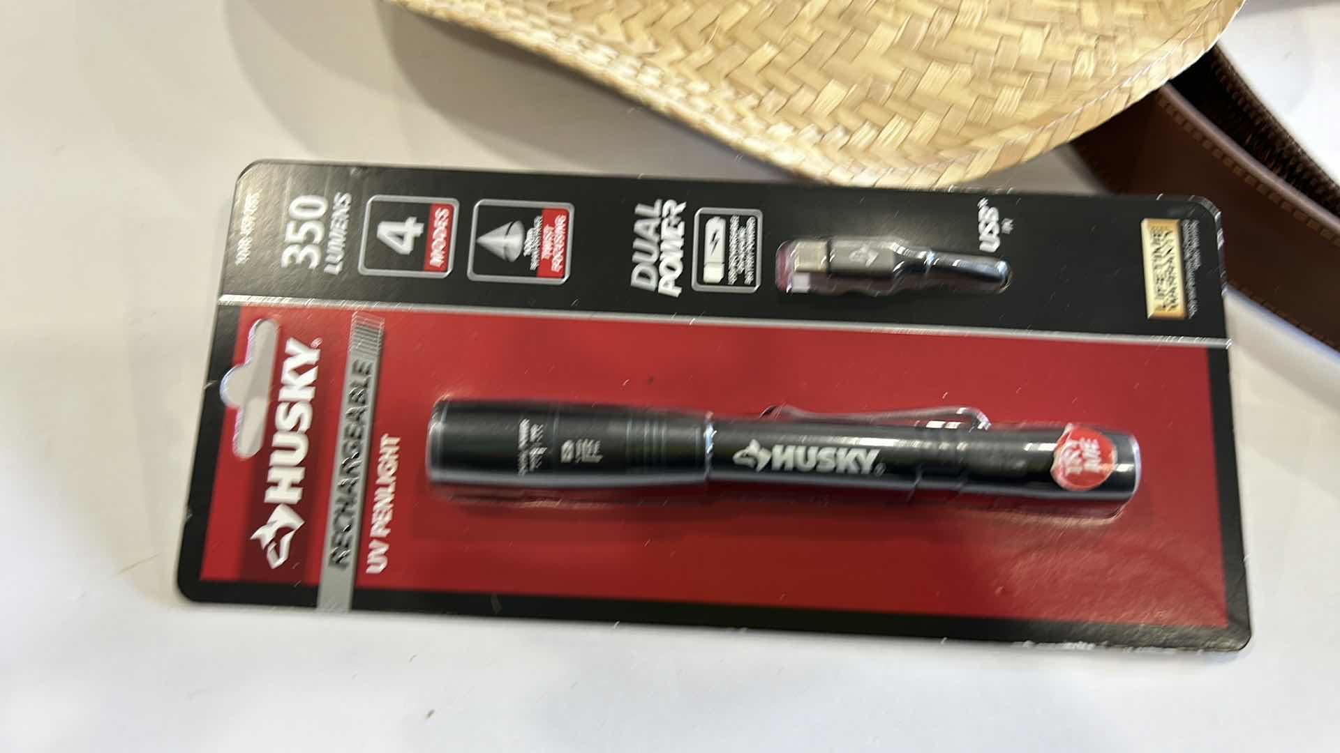 Photo 1 of MENS ASSORTMENT- COWBOY HAT, BELTS, BINOCULARS AND MORE