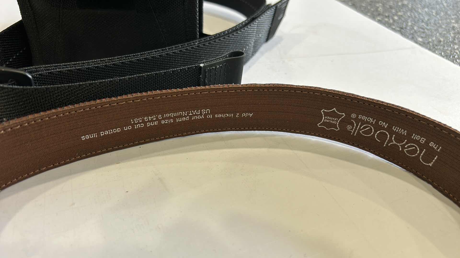 Photo 1 of MENS ASSORTMENT- COWBOY HAT, BELTS, BINOCULARS AND MORE