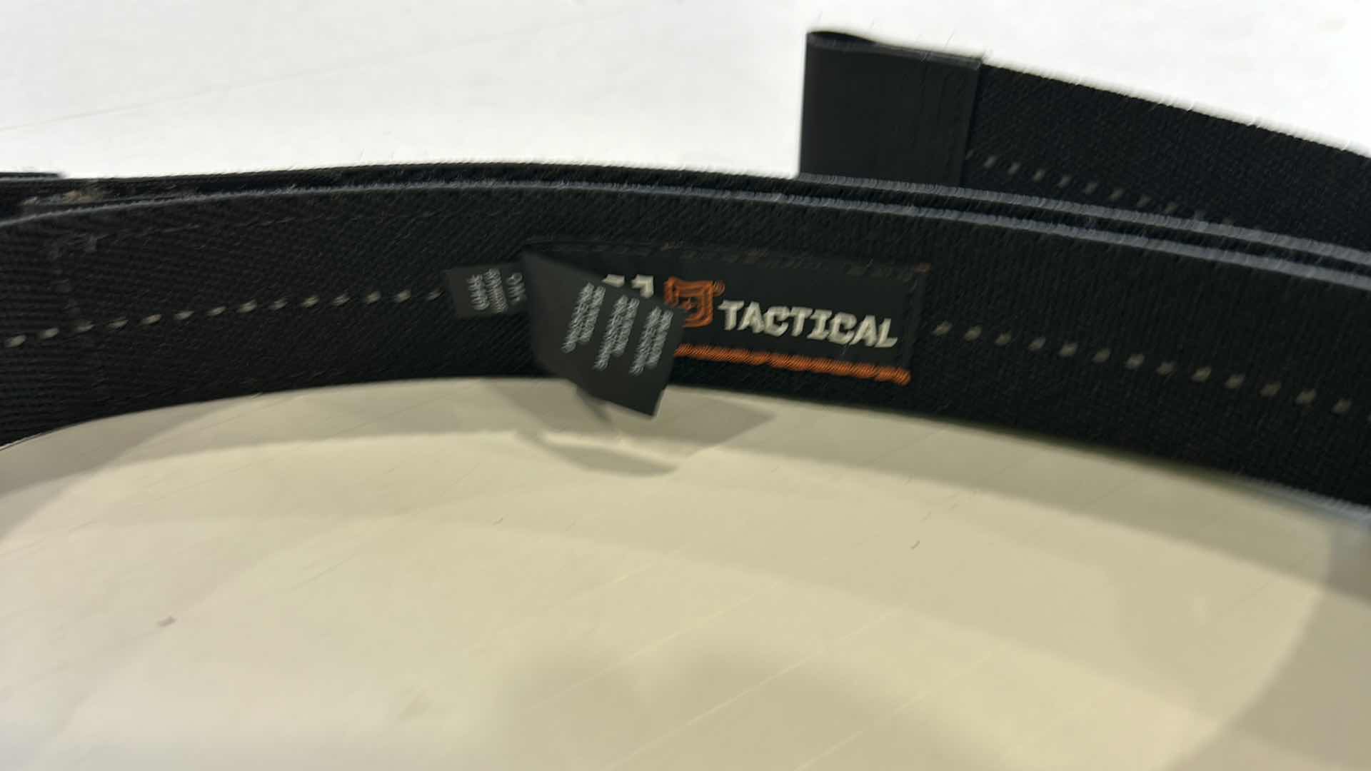 Photo 1 of MENS ASSORTMENT- COWBOY HAT, BELTS, BINOCULARS AND MORE