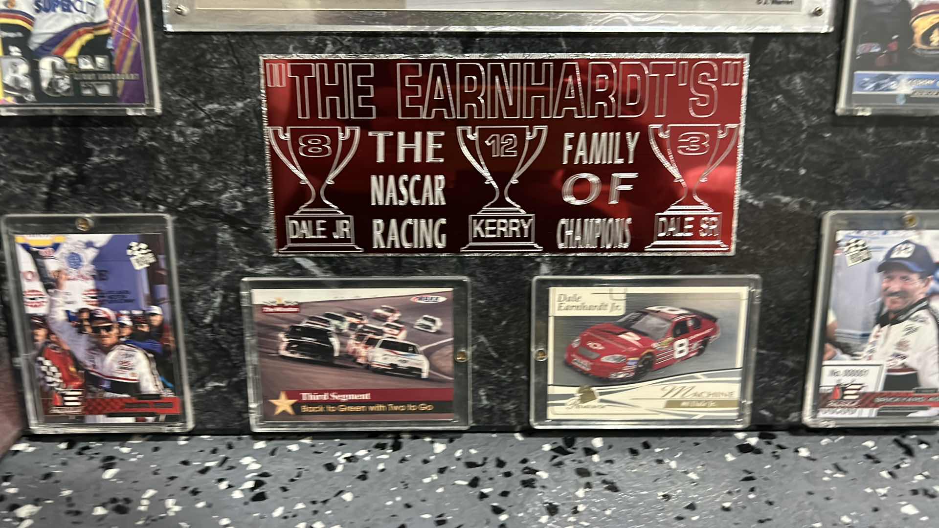 Photo 1 of DALE EARNHARDT COLLECTIBLE MEMORABILIA, SPORTS CARDS, AND MORE. 18“ x H16“