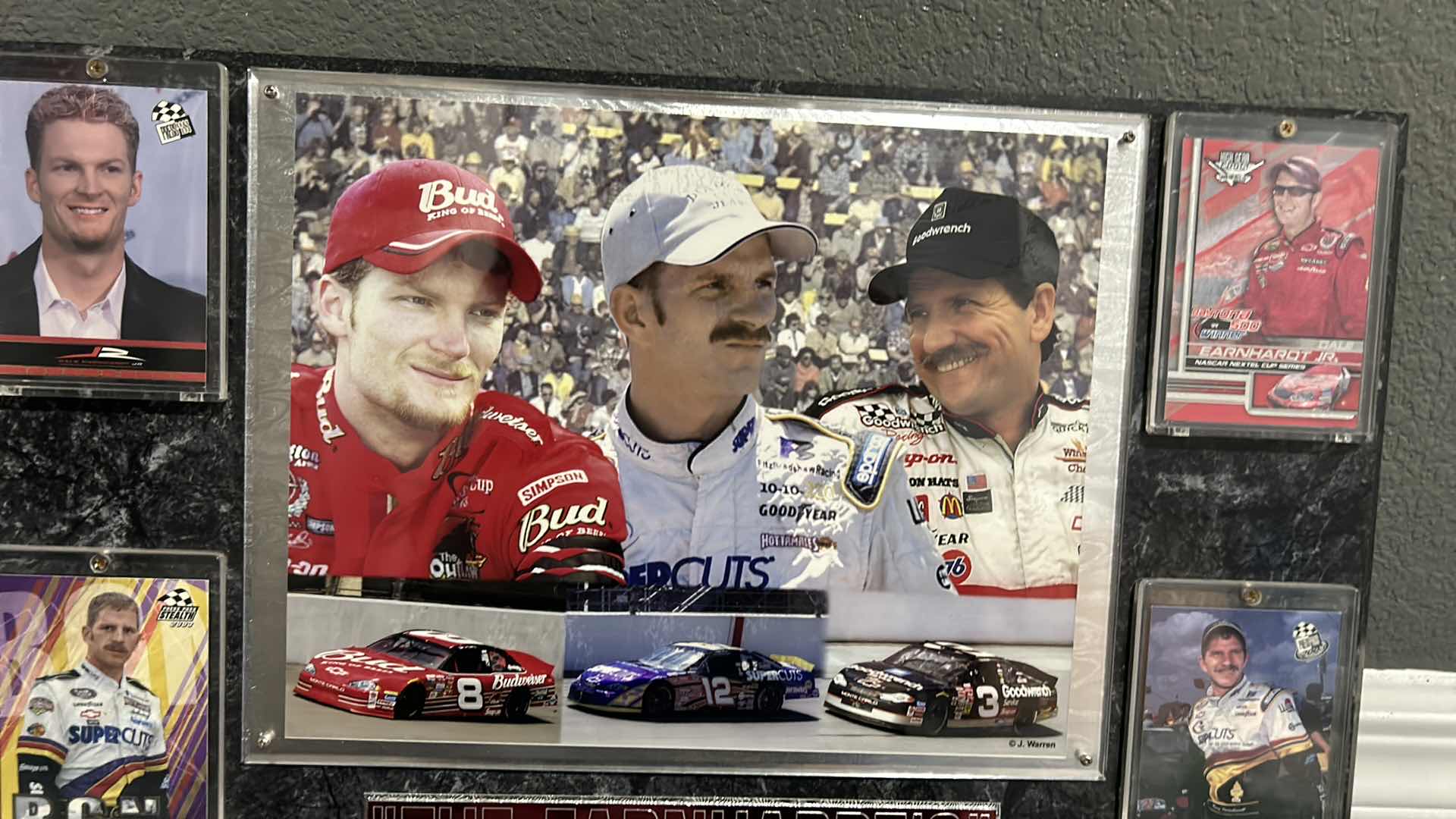 Photo 1 of DALE EARNHARDT COLLECTIBLE MEMORABILIA, SPORTS CARDS, AND MORE. 18“ x H16“