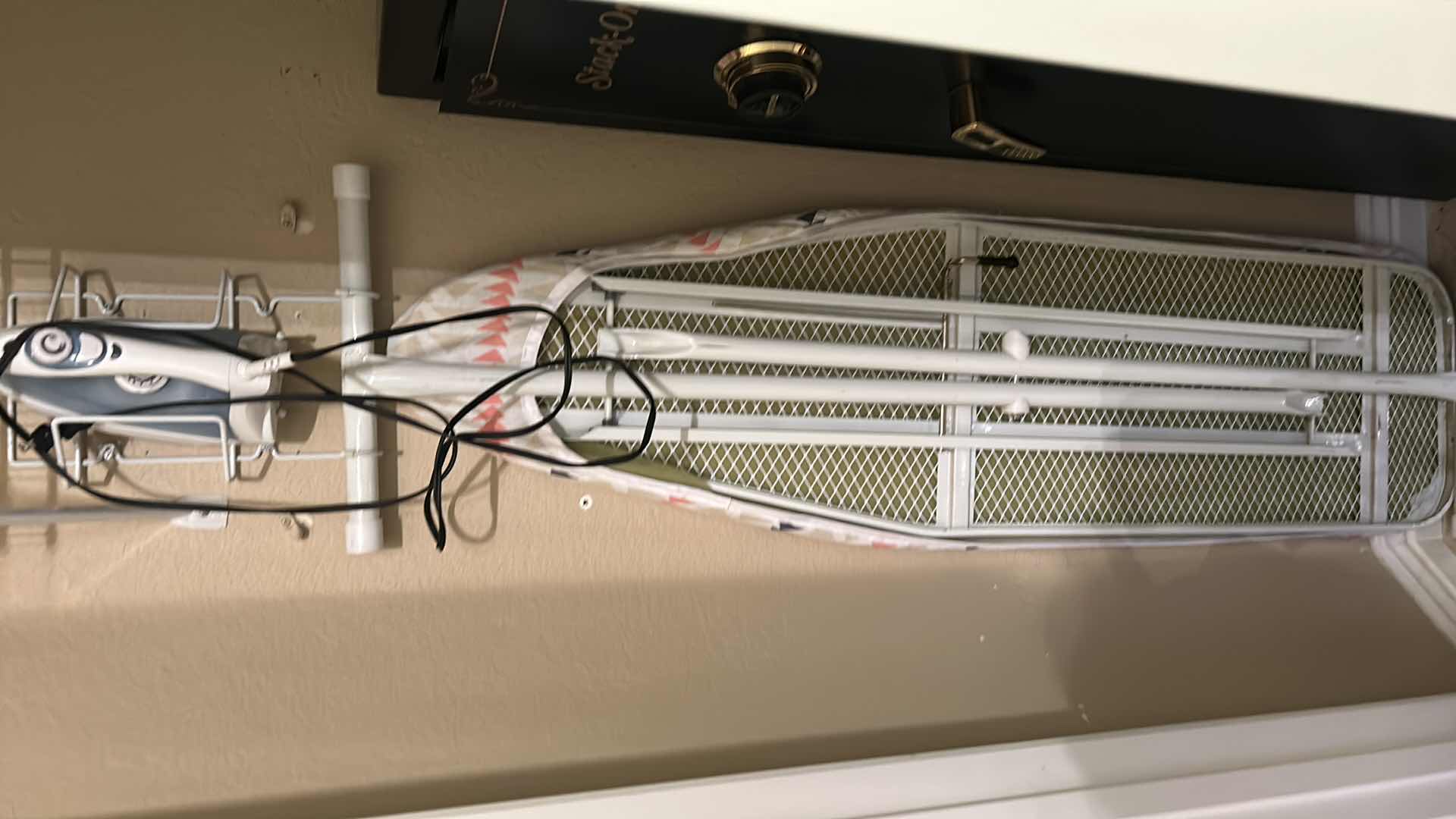 Photo 1 of IRON AND IRONING BOARD