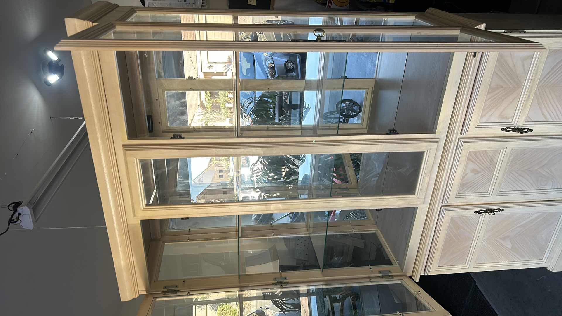 Photo 1 of HOME FURNISHINGS - LIGHT WOOD CURIO/CHINA CABINET WITH TWO GLASS SHELVES AND TWO DRAWERS. 42” X 15” X 79”.