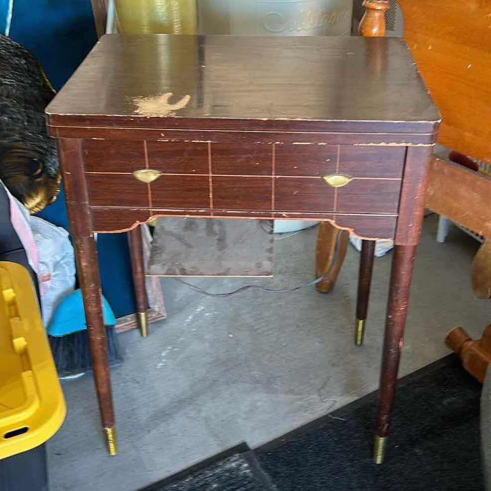 Photo 1 of VINTAGE SINGER SEWING MACHINE TABLE 25” X 17” X H31”.