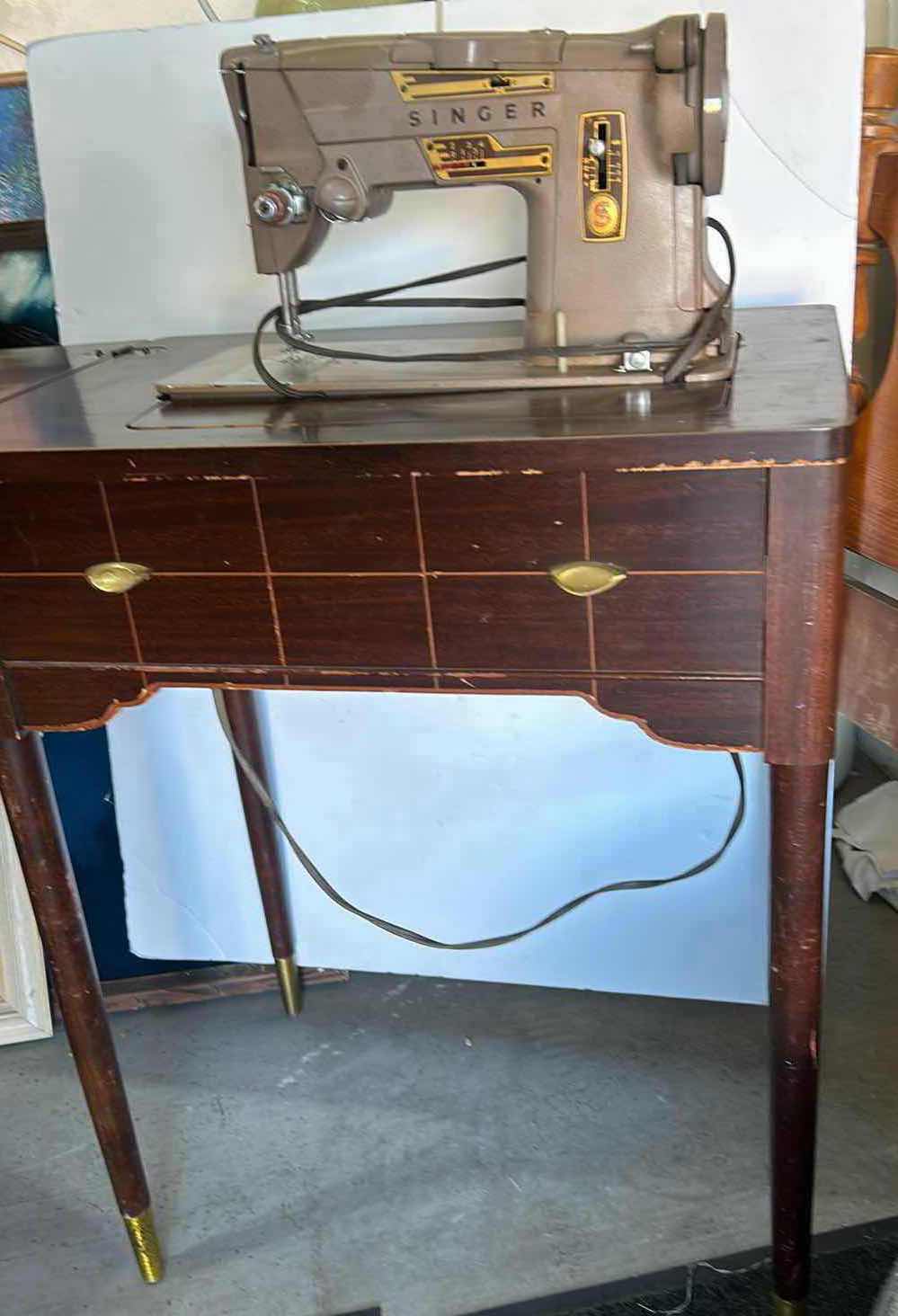 Photo 1 of VINTAGE SINGER SEWING MACHINE TABLE 25” X 17” X H31”.