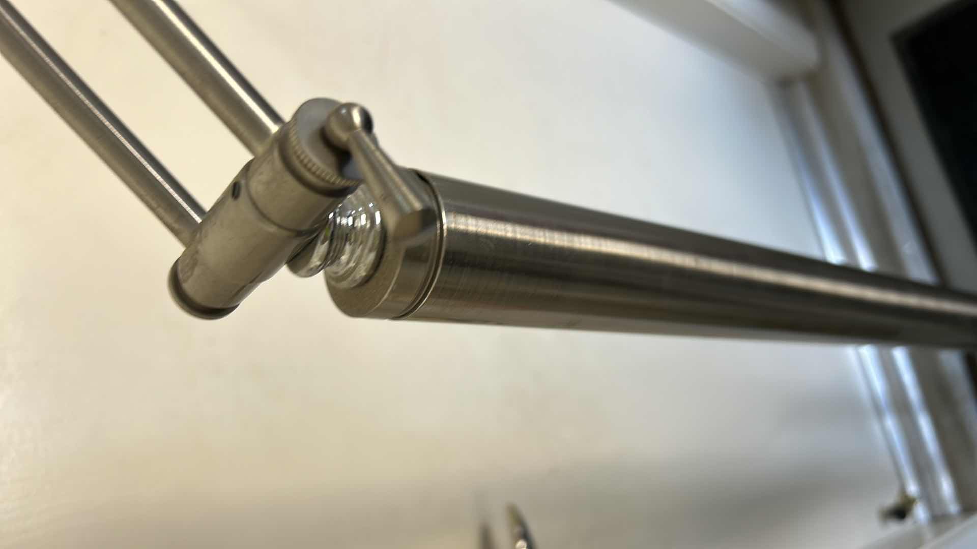 Photo 1 of MODERN METAL ADJUSTABLE FLOOR LAMP MEASURES 4’ TO 6’.