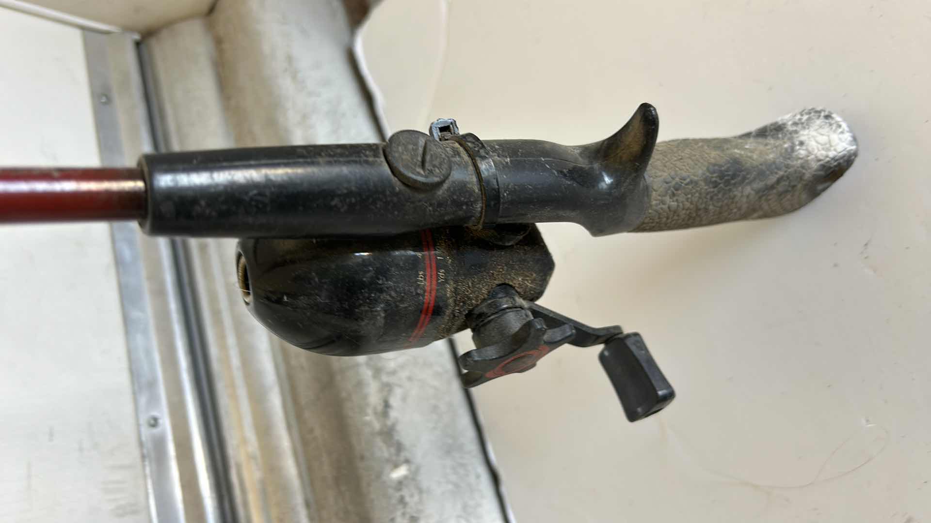 Photo 1 of TWO FISHING RODS AND REELS