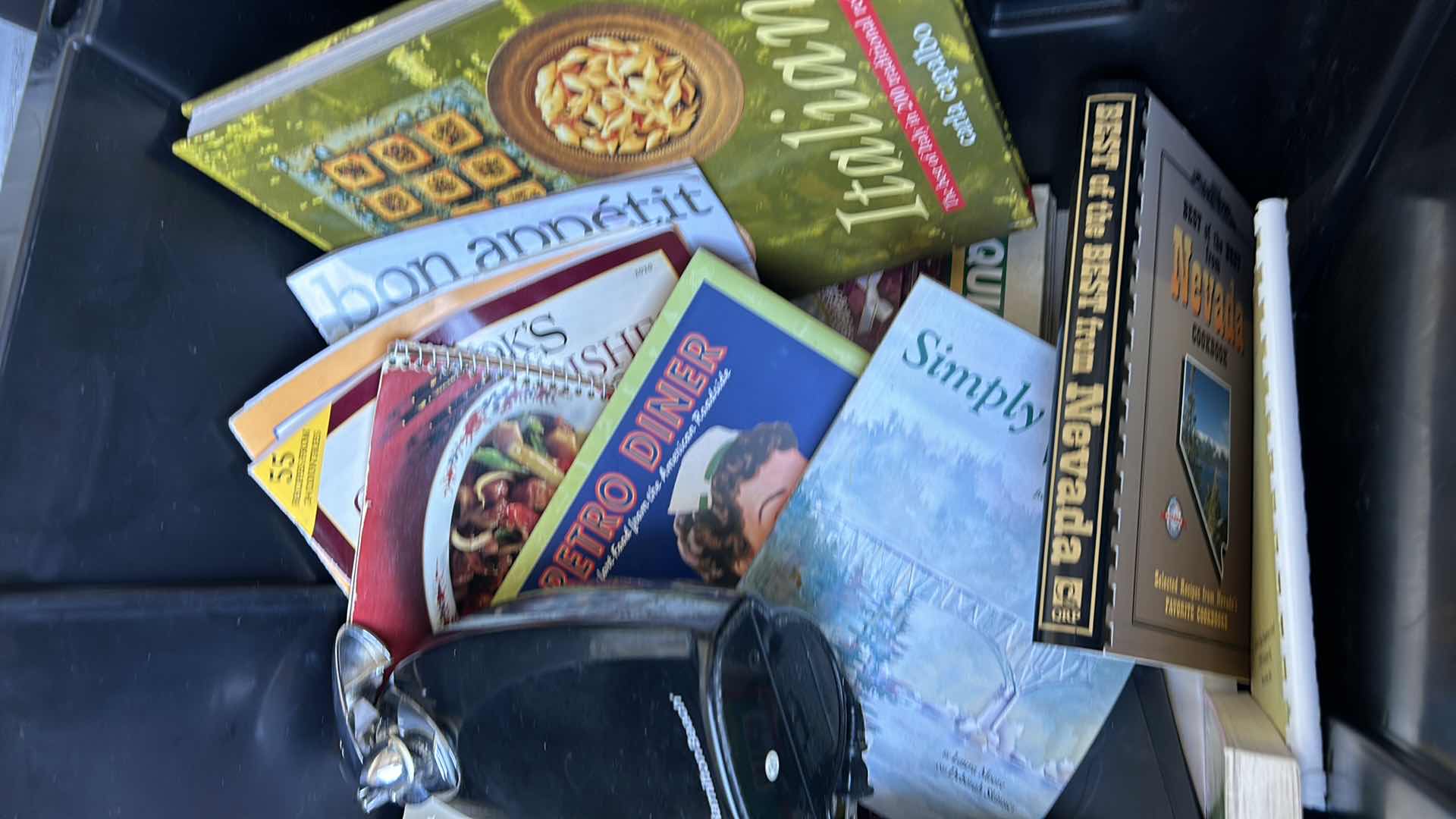 Photo 1 of LARGE TOTE FULL OF RECIPE BOOKS AND ONE CAN OPENER.