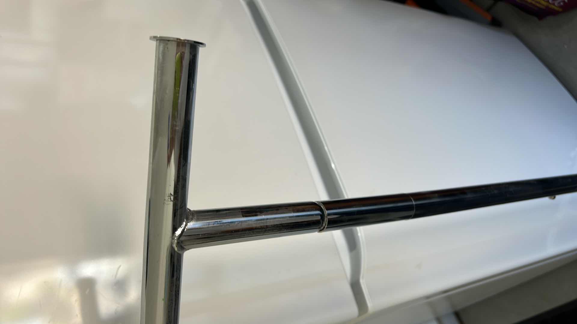 Photo 1 of STURDY, COLLAPSIBLE CLOTHING RACK ON WHEELS.