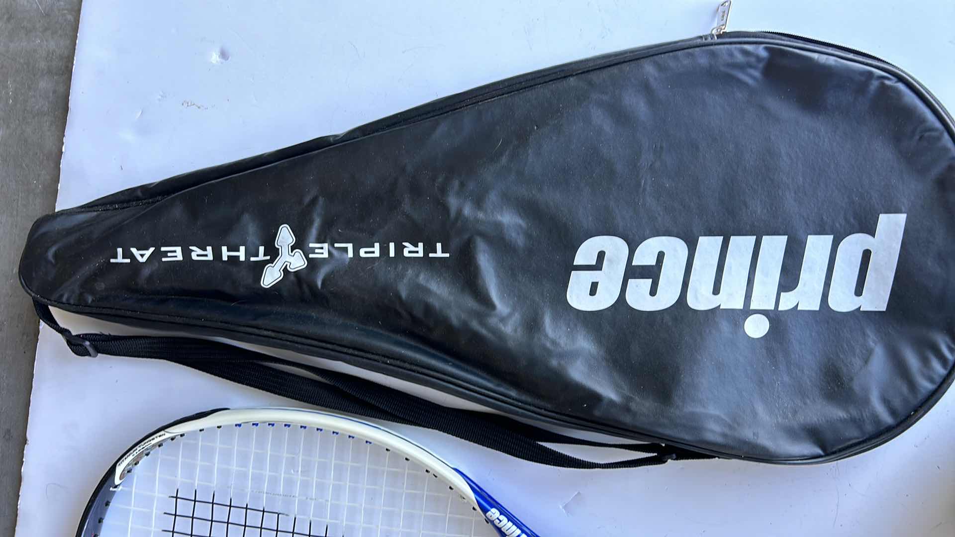 Photo 1 of PRINCE TRIPLE THREAT TENNIS RACKET.