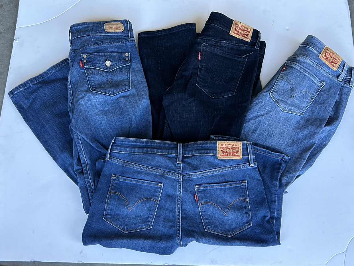 Photo 1 of WOMEN’S WEAR 4 LEVI STRAUSS SIZE 27-28 PETITE JEANS.