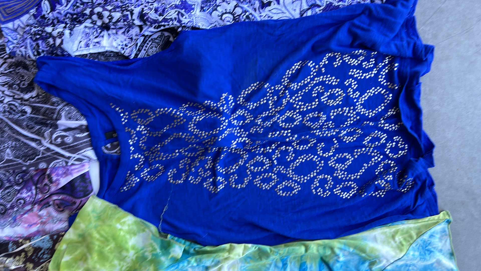 Photo 1 of WOMEN’S WEAR 10 TOP SIZE SMALL/MEDIUM.