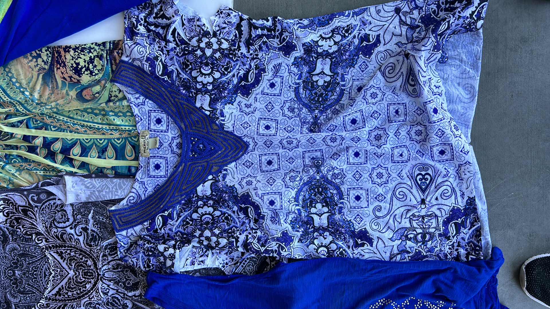 Photo 1 of WOMEN’S WEAR 10 TOP SIZE SMALL/MEDIUM.