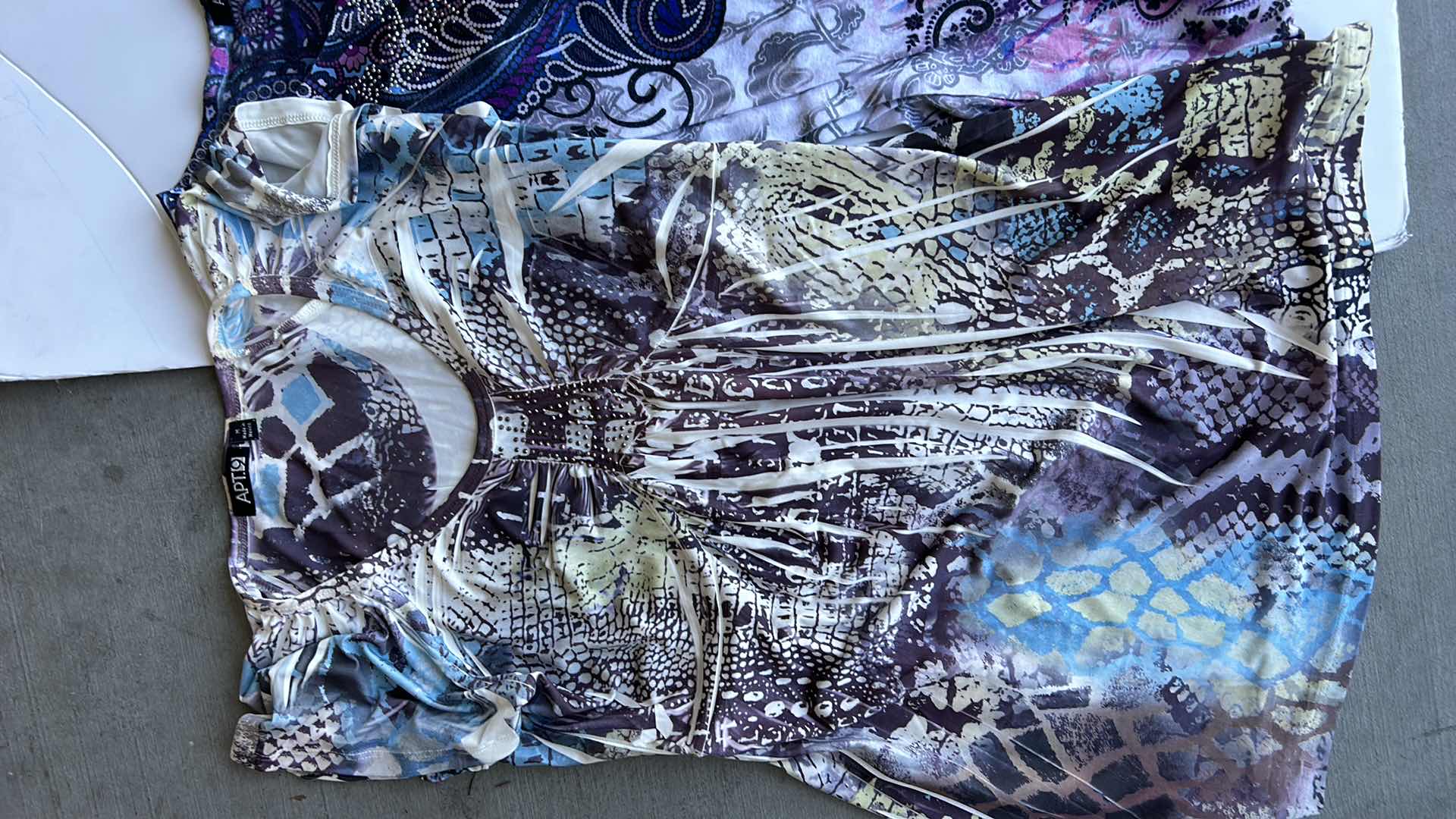 Photo 1 of WOMEN’S WEAR 10 TOP SIZE SMALL/MEDIUM.