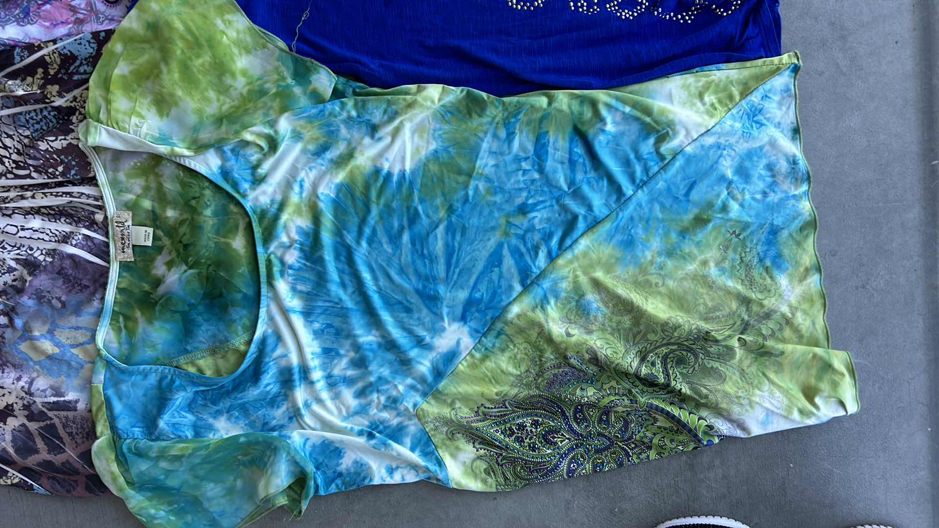 Photo 1 of WOMEN’S WEAR 10 TOP SIZE SMALL/MEDIUM.