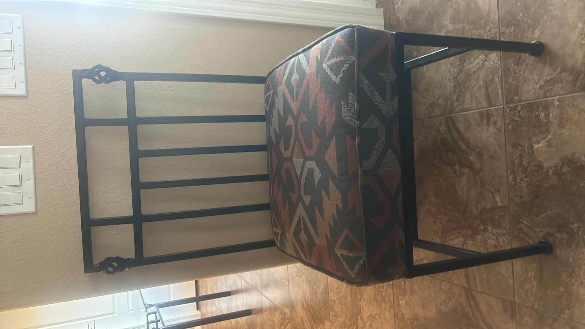 Photo 1 of HEAVY IRON CHAIR WITH THICK UPHOLSTERED PADDING.