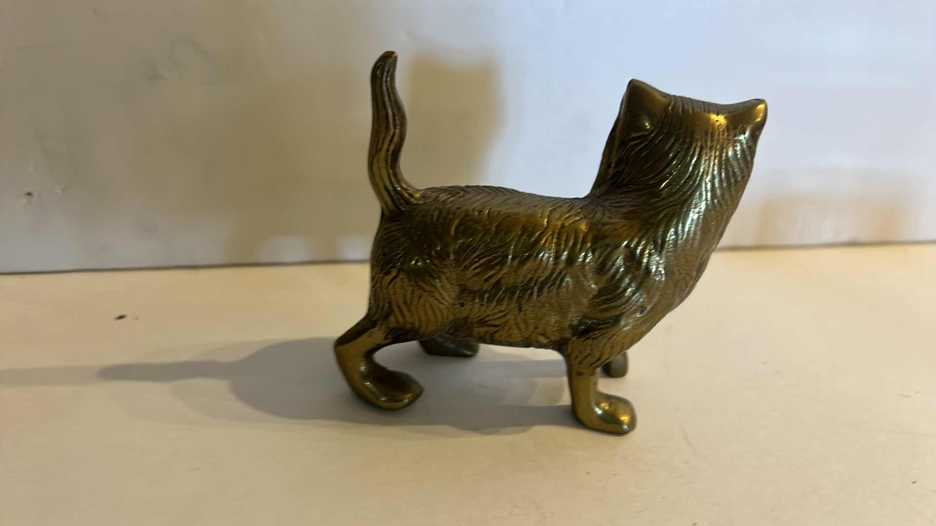 Photo 1 of 4- HOME DÉCOR: VASE H 10”, TWO METAL CATS, AND A GLASS COLISEUM SEE-THROUGH PAPERWEIGHT