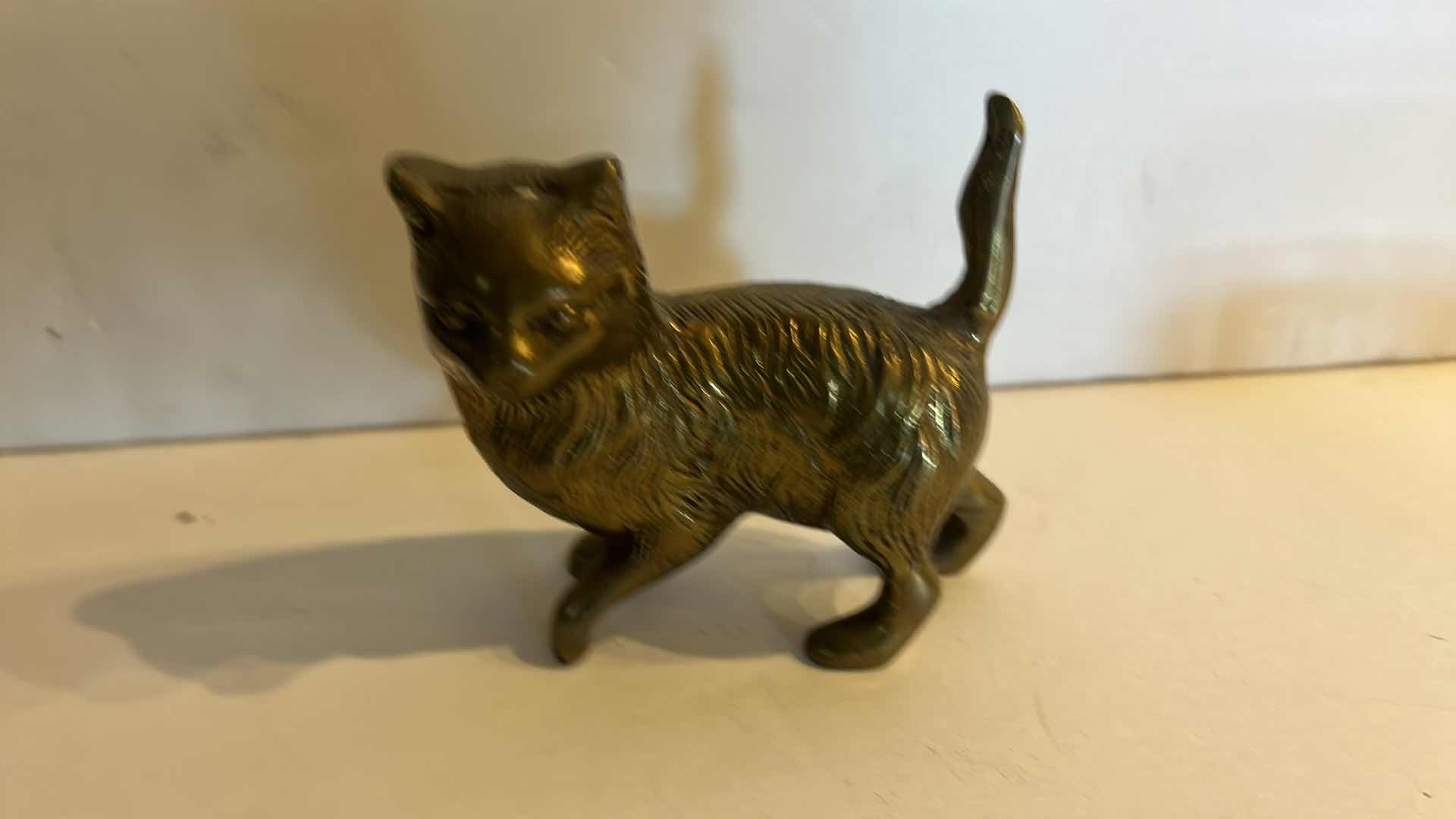 Photo 1 of 4- HOME DÉCOR: VASE H 10”, TWO METAL CATS, AND A GLASS COLISEUM SEE-THROUGH PAPERWEIGHT