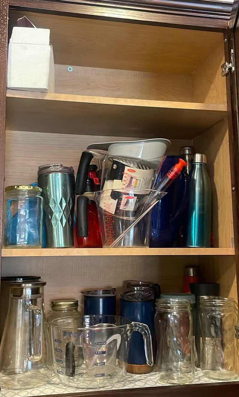 Photo 1 of CONTENTS OF CABINET - TRAVEL AND MEASURING CUPS