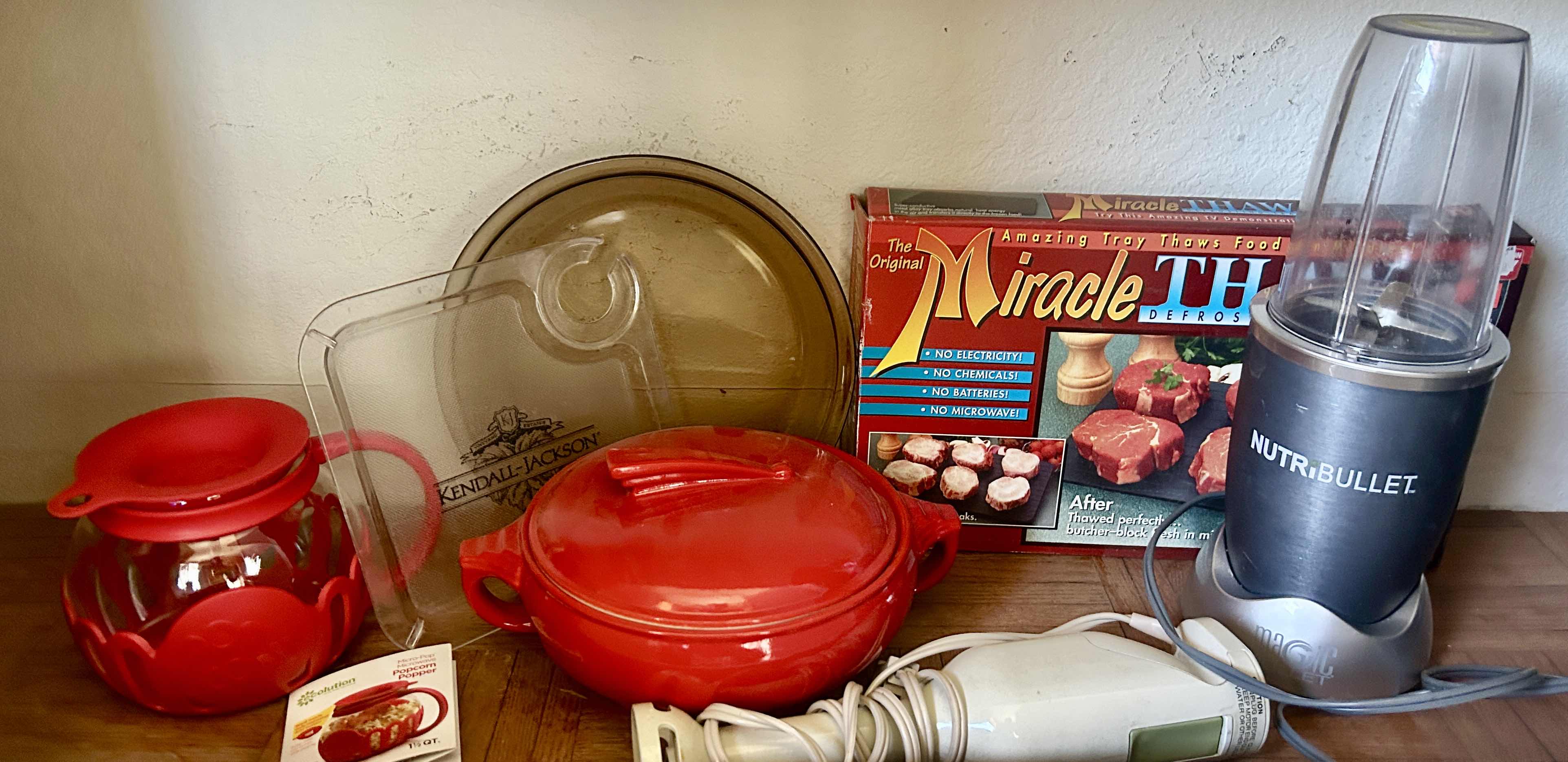 Photo 1 of CONTENTS ON SHELF - KITCHEN ISLAND- POPCORN MAKER, CASSEROLE DISH WITH LID, NUTR.BULLET AND MORE