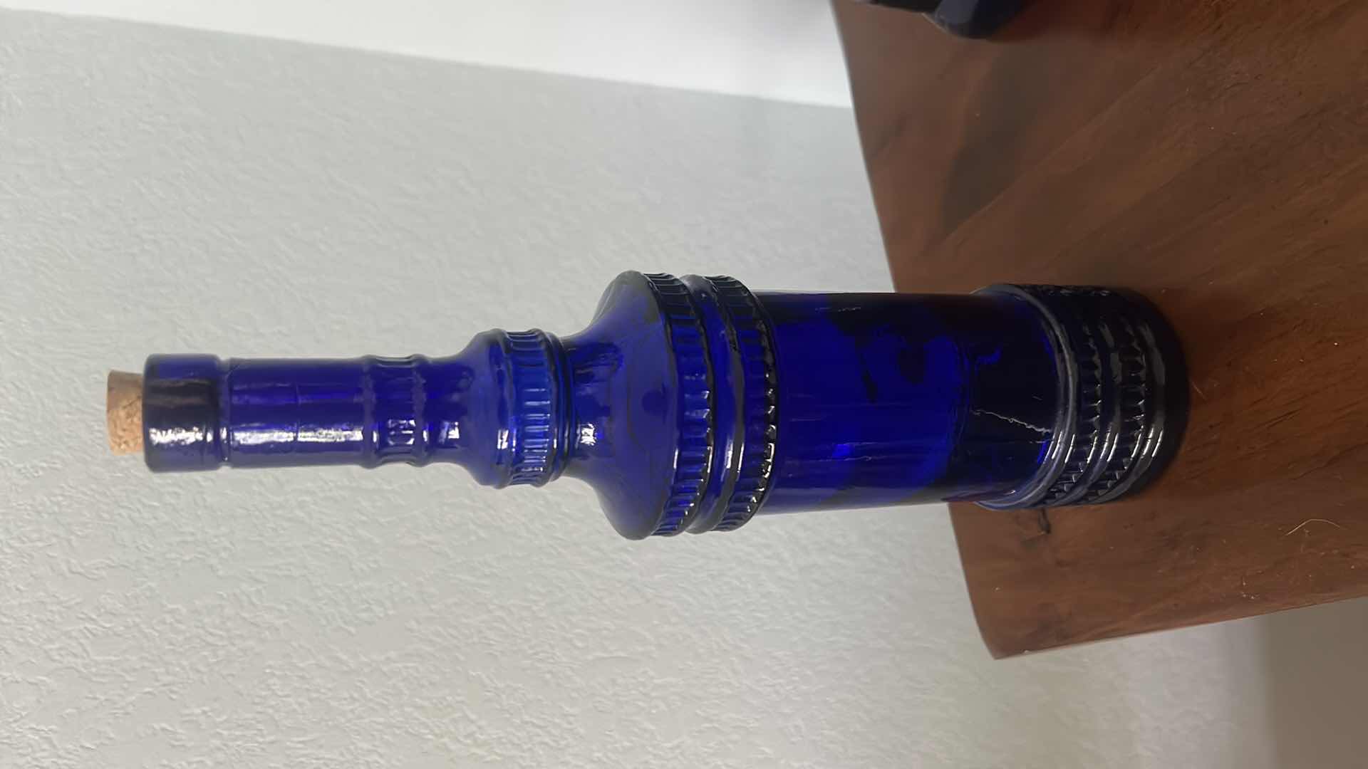 Photo 1 of 4 PC BLUE COLORED GLASS BOTTLES (TALLEST 19.5”)