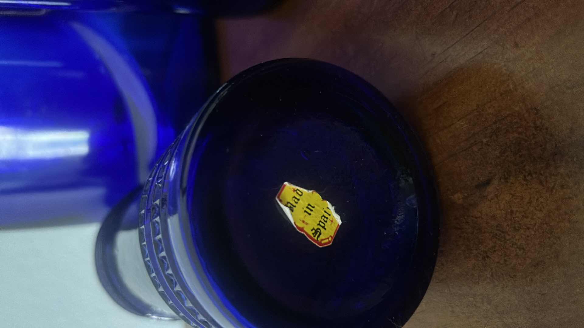 Photo 1 of 4 PC BLUE COLORED GLASS BOTTLES (TALLEST 19.5”)