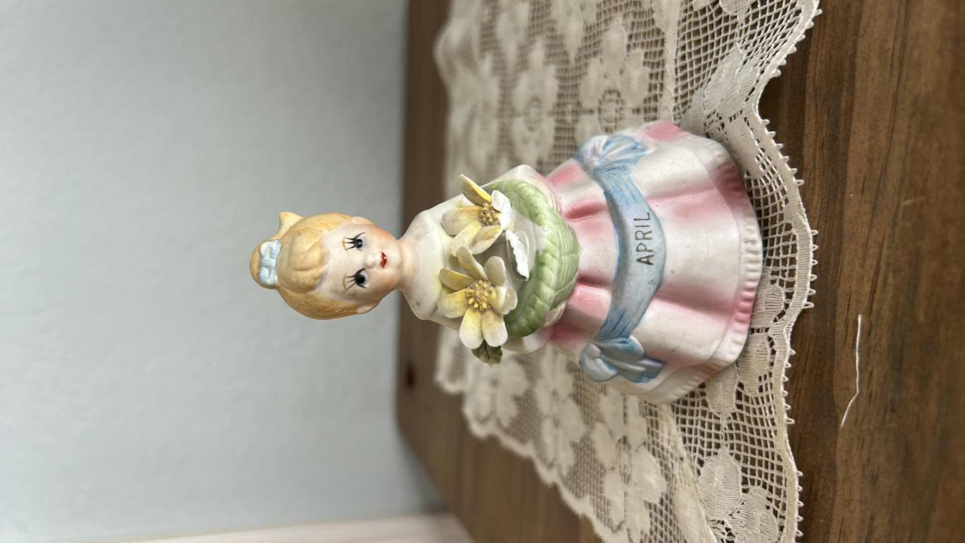 Photo 1 of VINTAGE DOLL, PORCELAIN FIGURINE, DOILY AND BEyoutiful SIGN