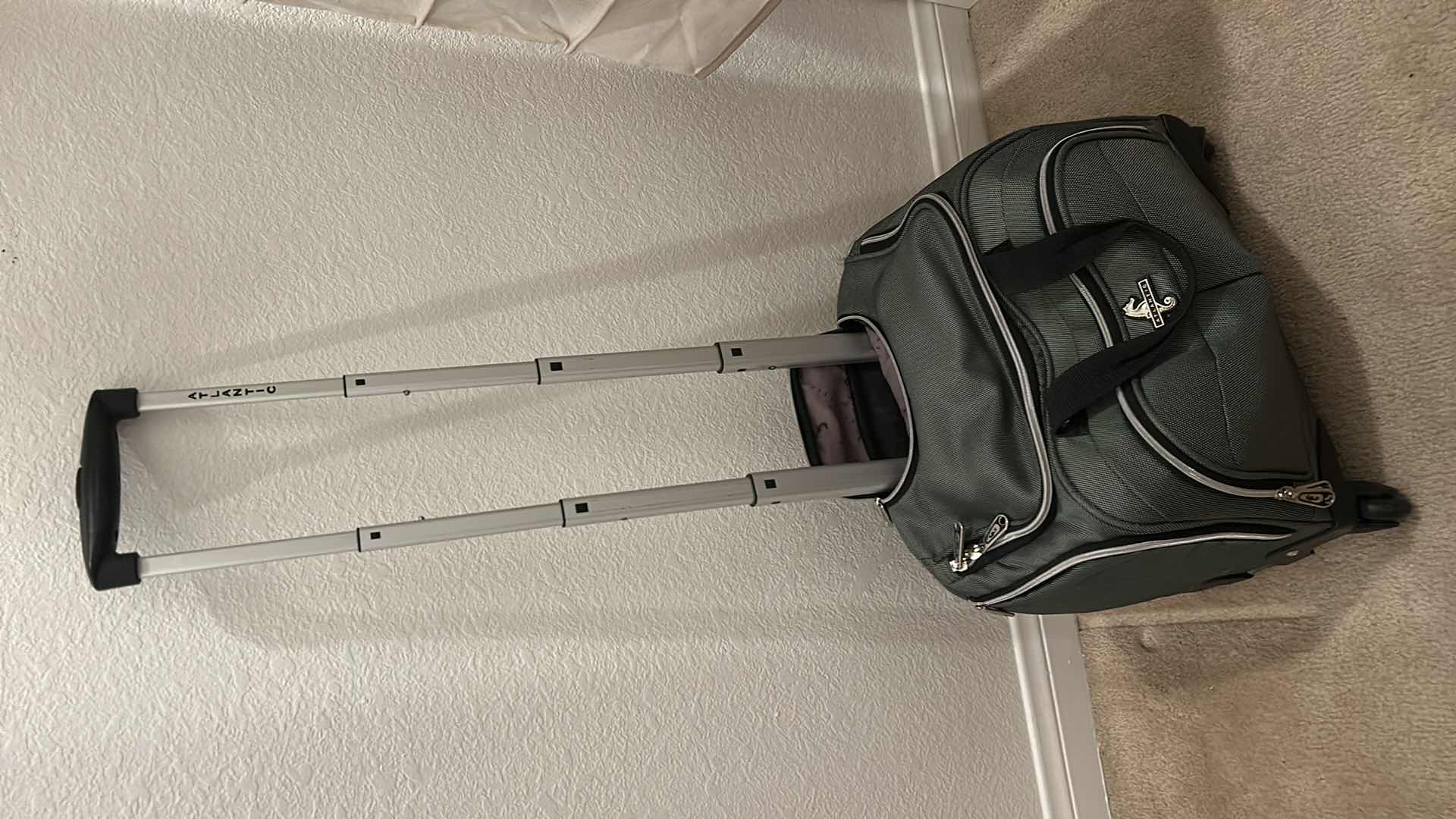 Photo 1 of WHEELED TRAVEL BAG WITH POP UP HANDLE AND 2 COSMETICS BAGS
