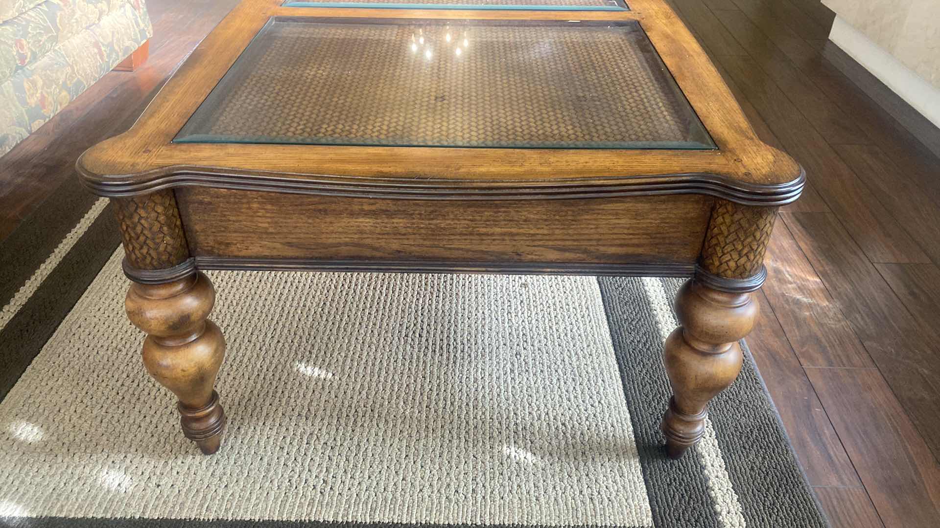 Photo 1 of OAK COFFEE TABLE WITH WOOD BRAID DETAIL AND GLASS INSERTS 47” x 31 1/2” H 19 1/2”
