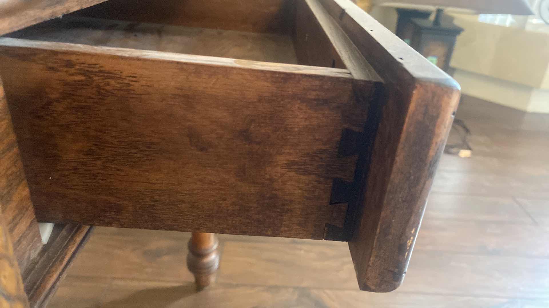 Photo 1 of ASHLEY FURNITURE OAK END TABLE WITH WOOD BRAID DETAIL AND DOVETAIL DRAWER 26” x 27” H 25 1/2”