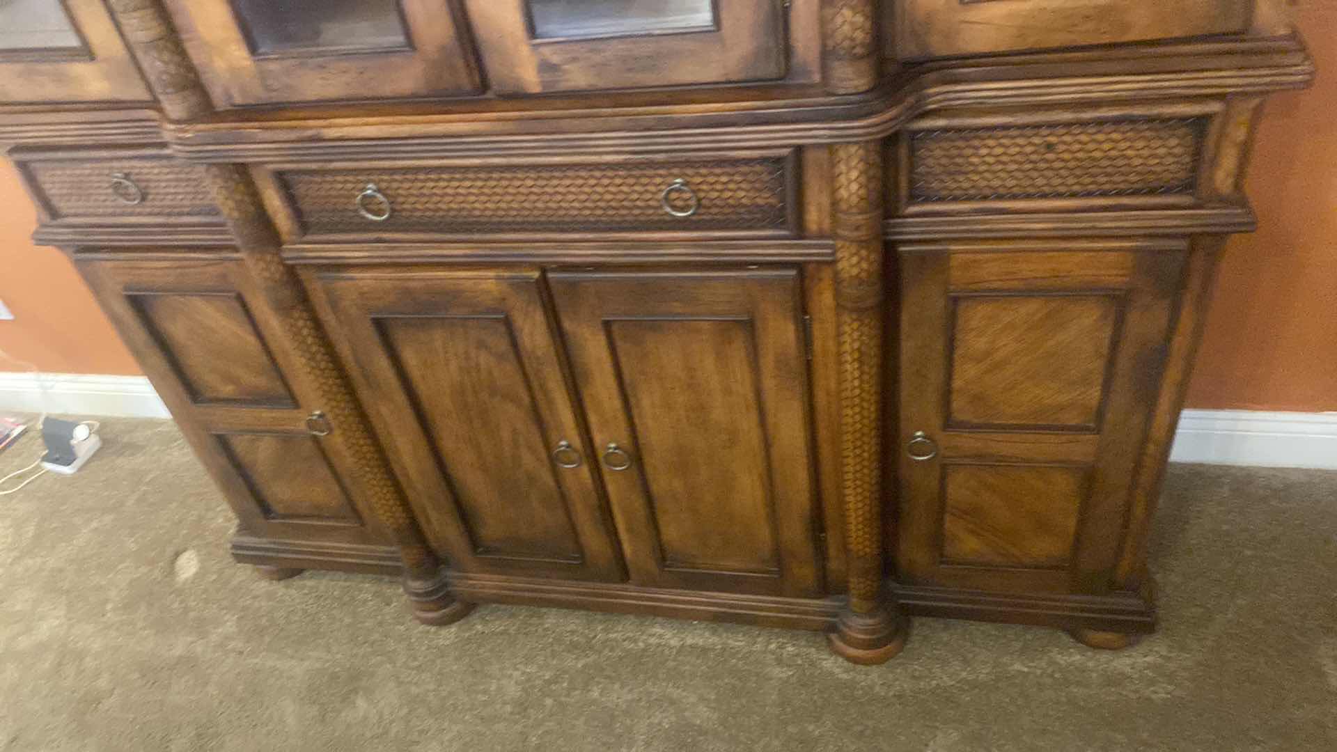 Photo 1 of ASHLEY FURNITURE WOOD CHINA DISPLAY WITH WOOD BRAID ACCENTS AND DOVETAIL DRAWERS 62” x 17” H81” (contents not included)