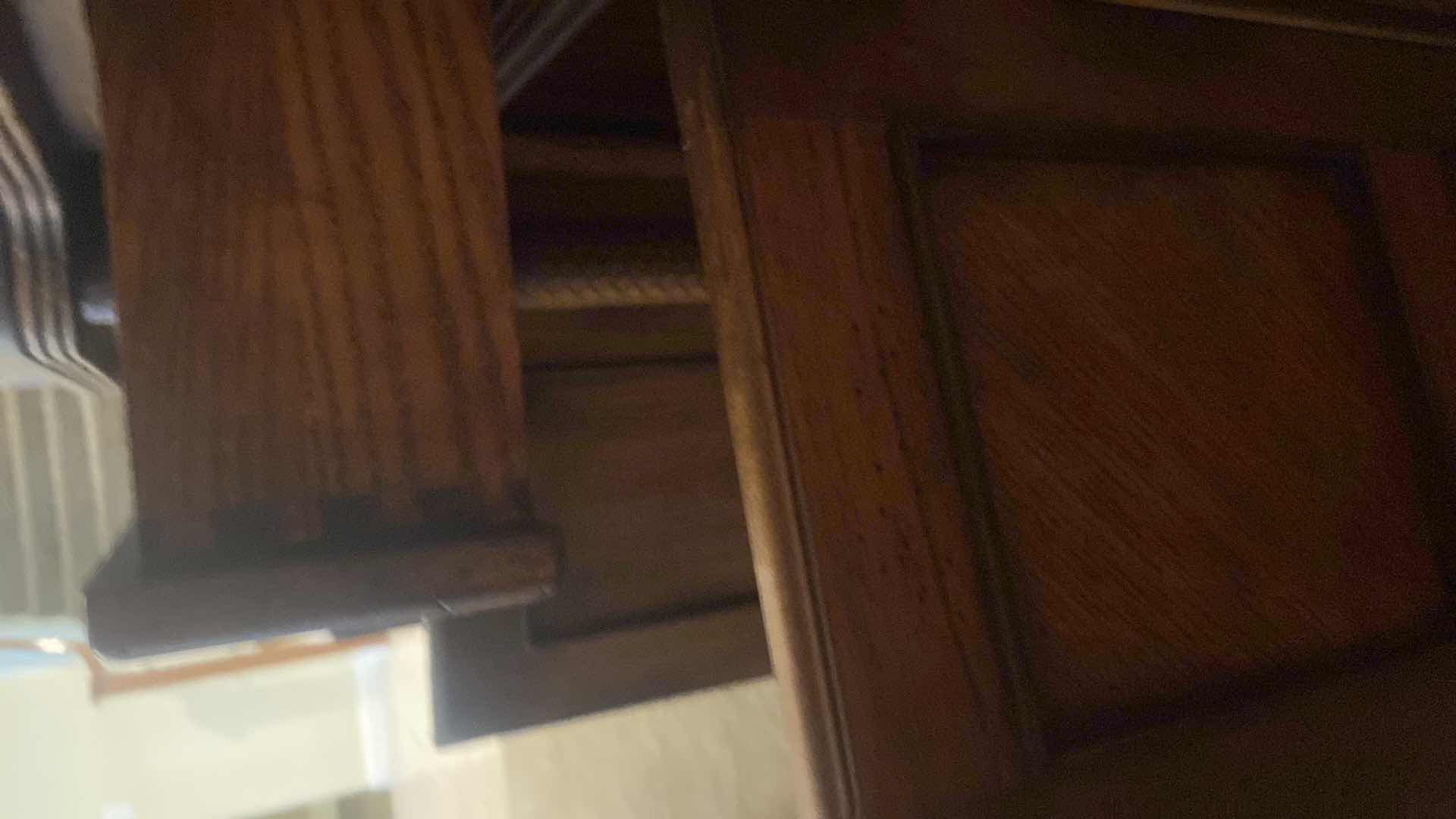 Photo 1 of ASHLEY FURNITURE WOOD CHINA DISPLAY WITH WOOD BRAID ACCENTS AND DOVETAIL DRAWERS 62” x 17” H81” (contents not included)