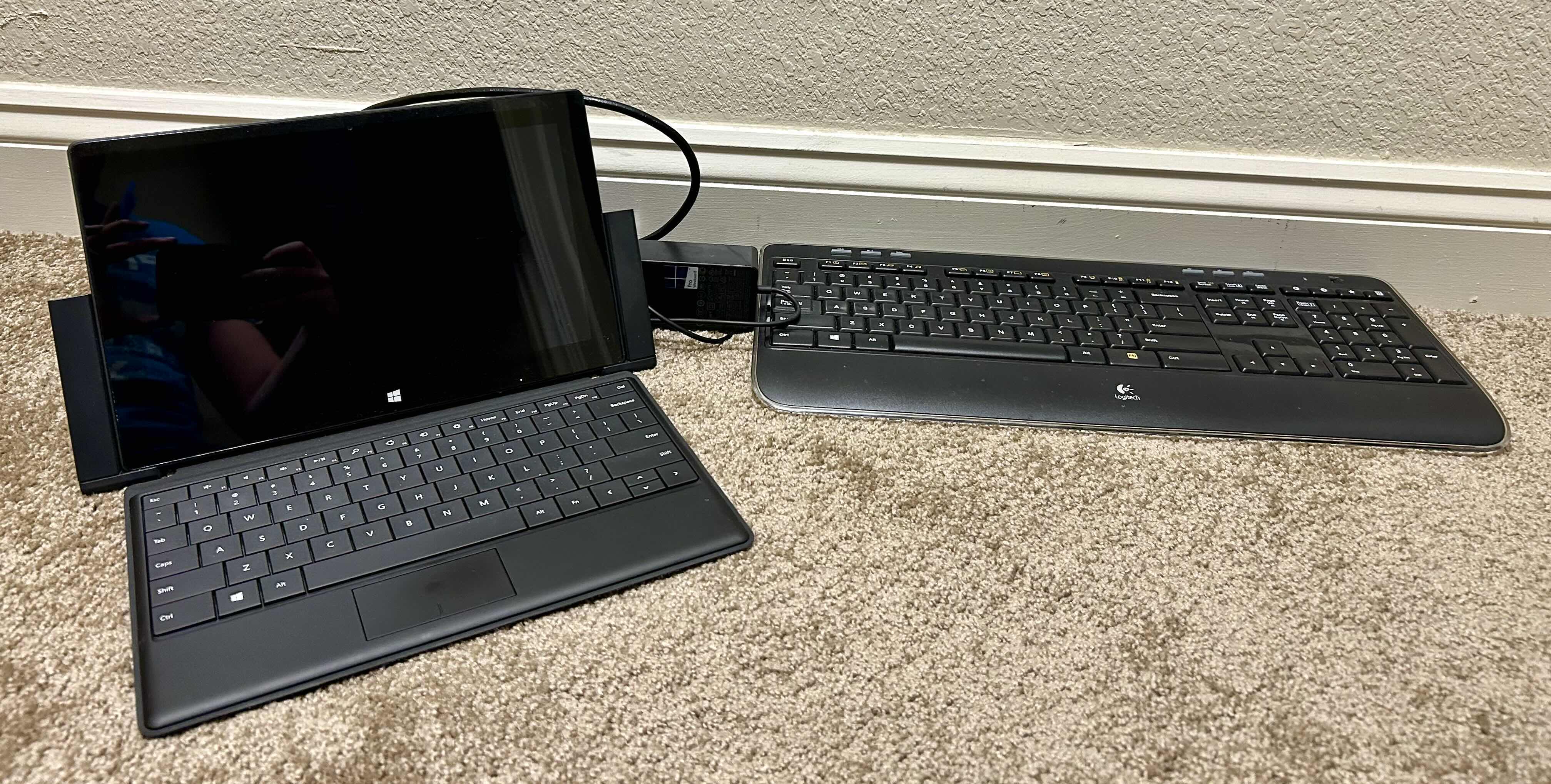 Photo 1 of MICROSOFT WINDOWS TABLET COMPUTER, KEYBOARDS AND WIRES