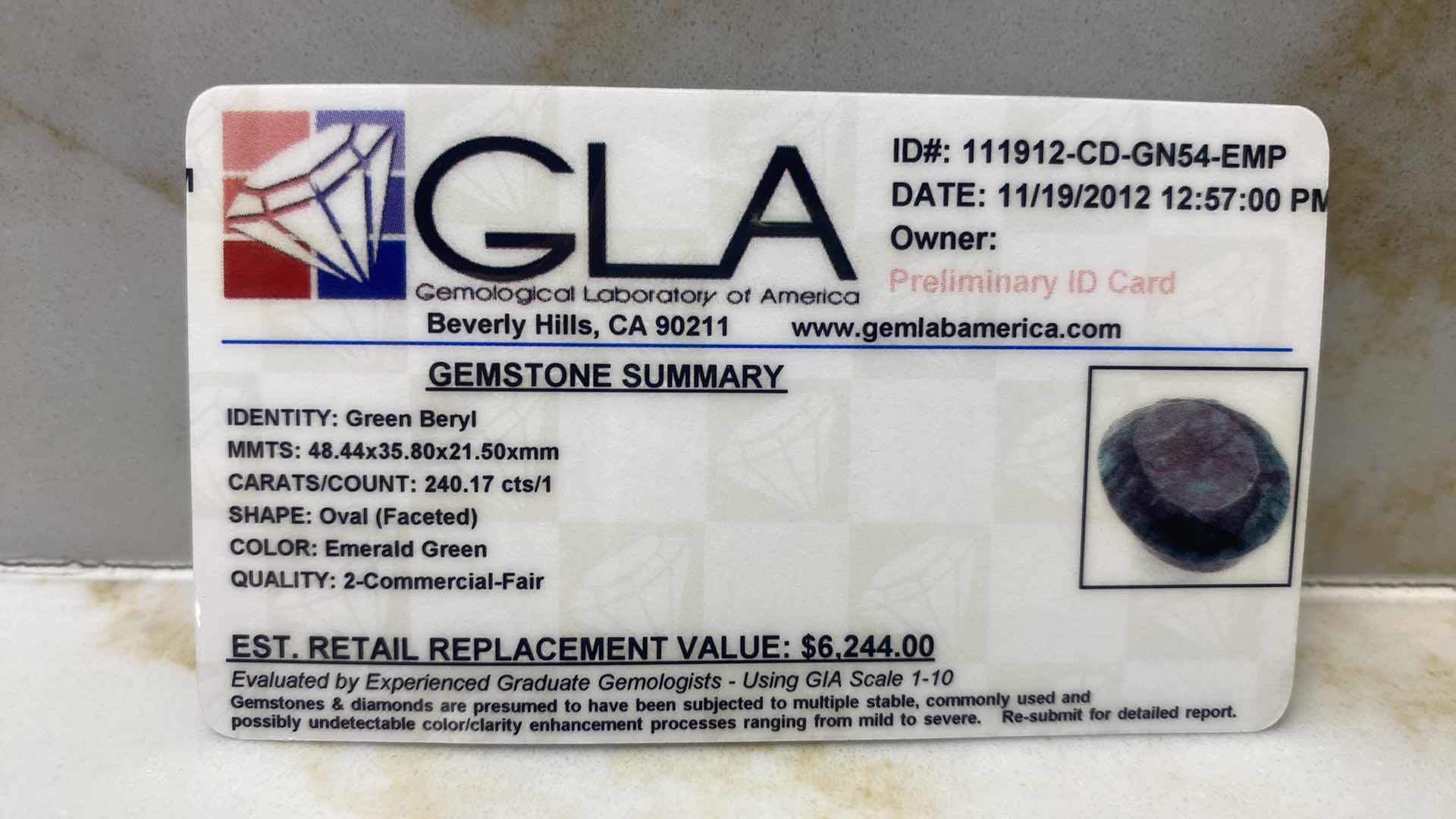 Photo 1 of GREEN BERYL OVAL FACETED 240.17 cts GEMSTONE GLA CERTIFIED 111912