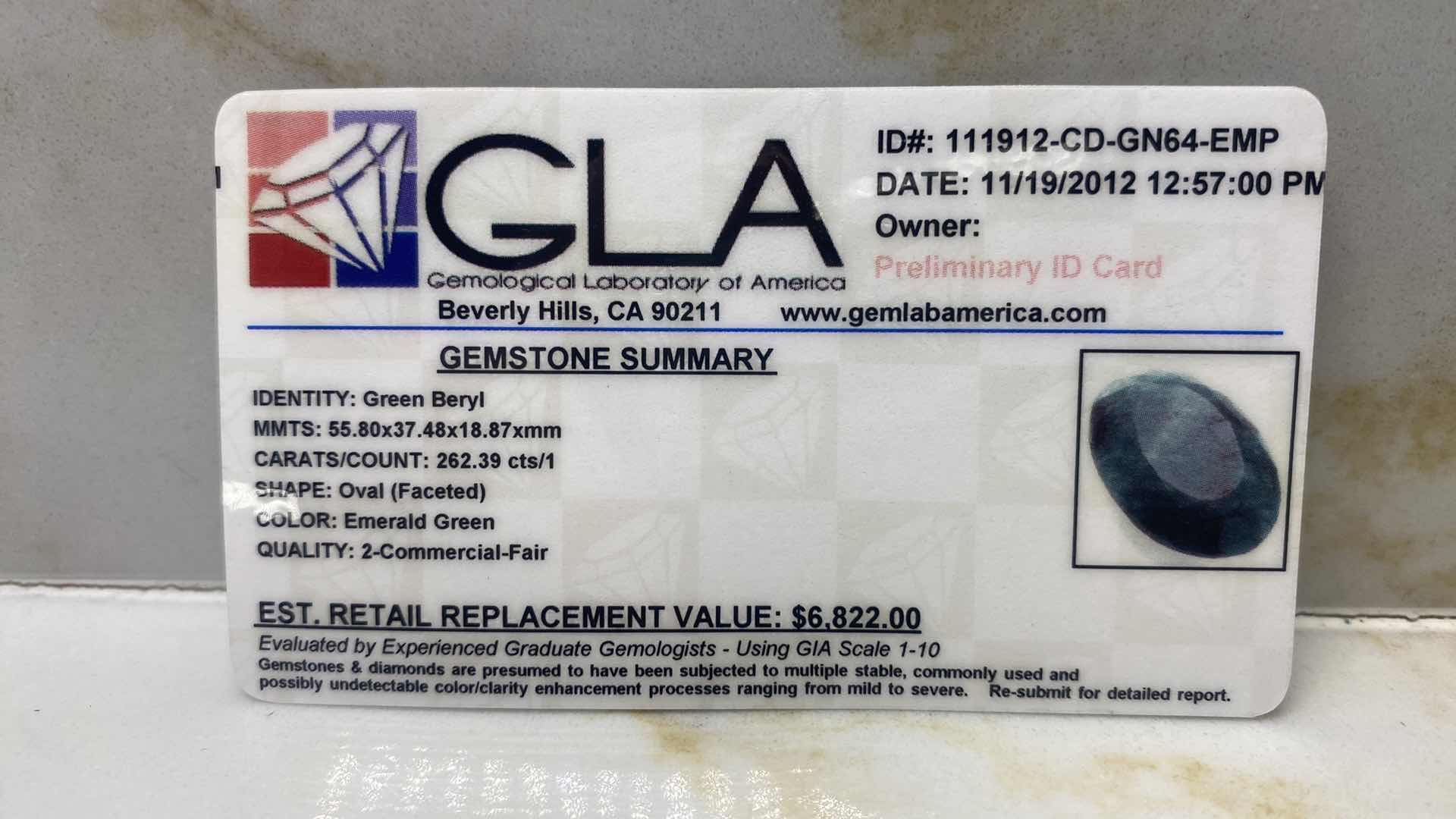 Photo 1 of GREEN BERYL OVAL FACETED 262.39 cts GEMSTONE GLA CERTIFIED 111912