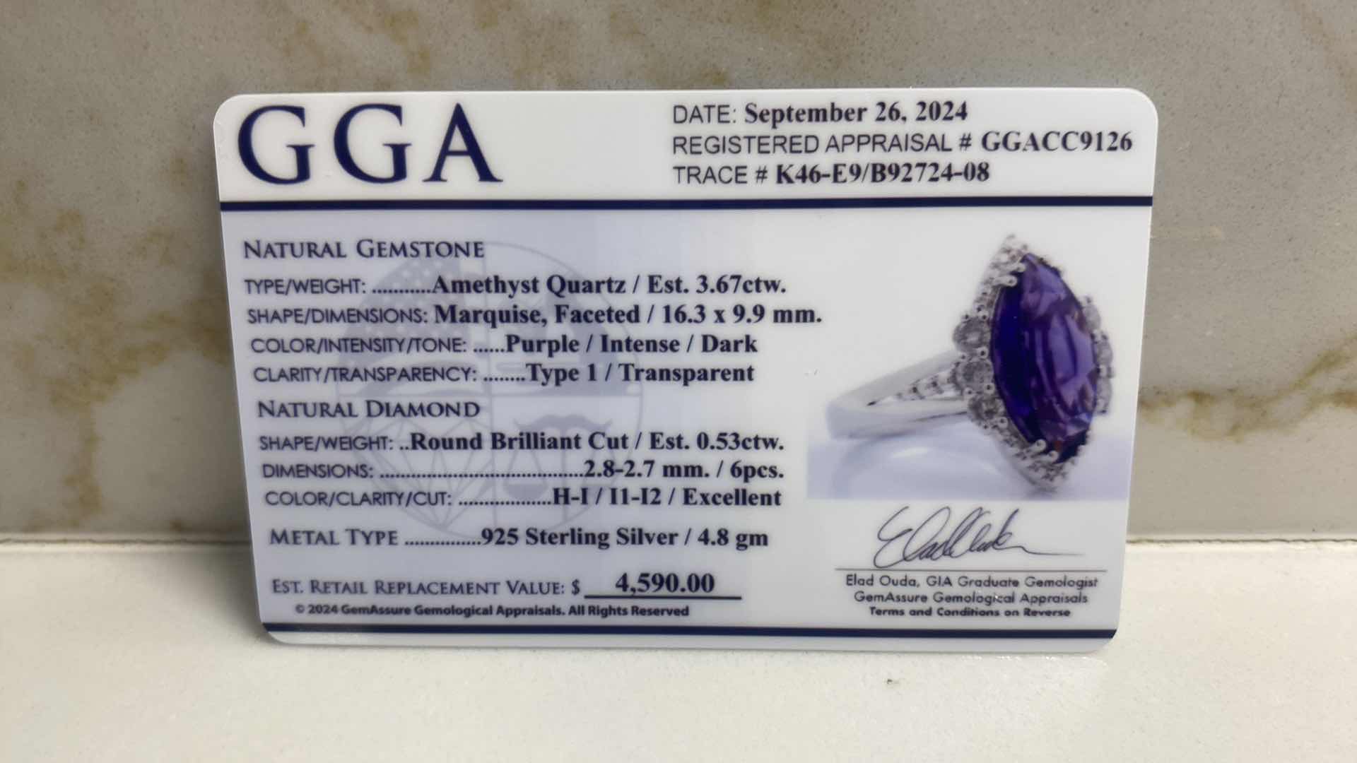 Photo 1 of 925 STERLING SILVER RING 4.8gm W/AMETHYST QUARTZ EST 3.67ctw MARQUIS CUT WITH NATURAL DIAMONDS ROUND BRILLIANT CUT EST .053ctw SIZE 7 GGA CERTIFIED APPRAISAL K46E9