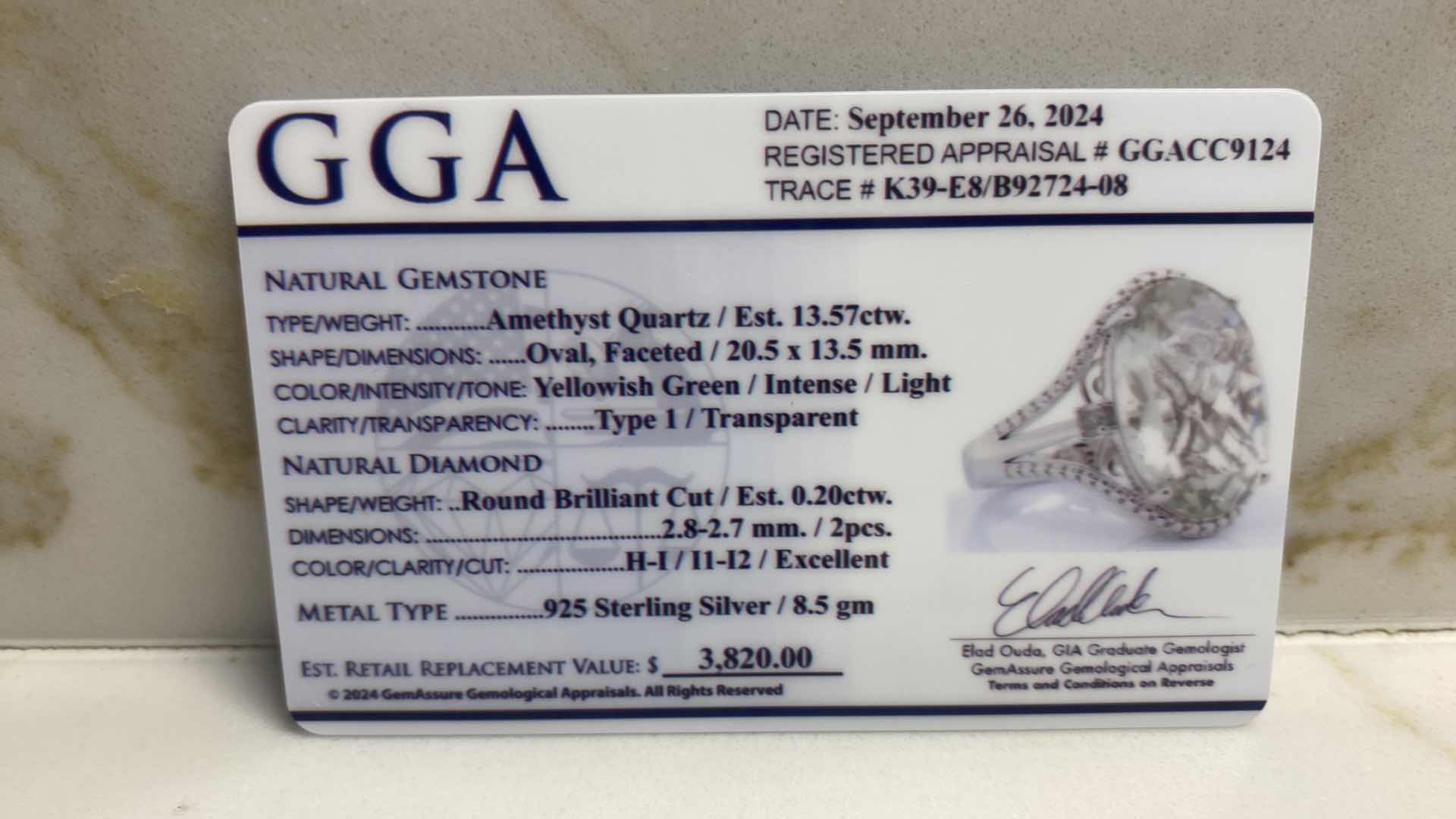 Photo 1 of 925 STERLING SILVER RING 8.5gm W/AMETHYST QUARTZ EST 13.57ctw OVAL WITH NATURAL DIAMOND ROUND BRILLIANT CUT EST .20ctw SIZE 7 GGA CERTIFIED APPRAISAL K39E8