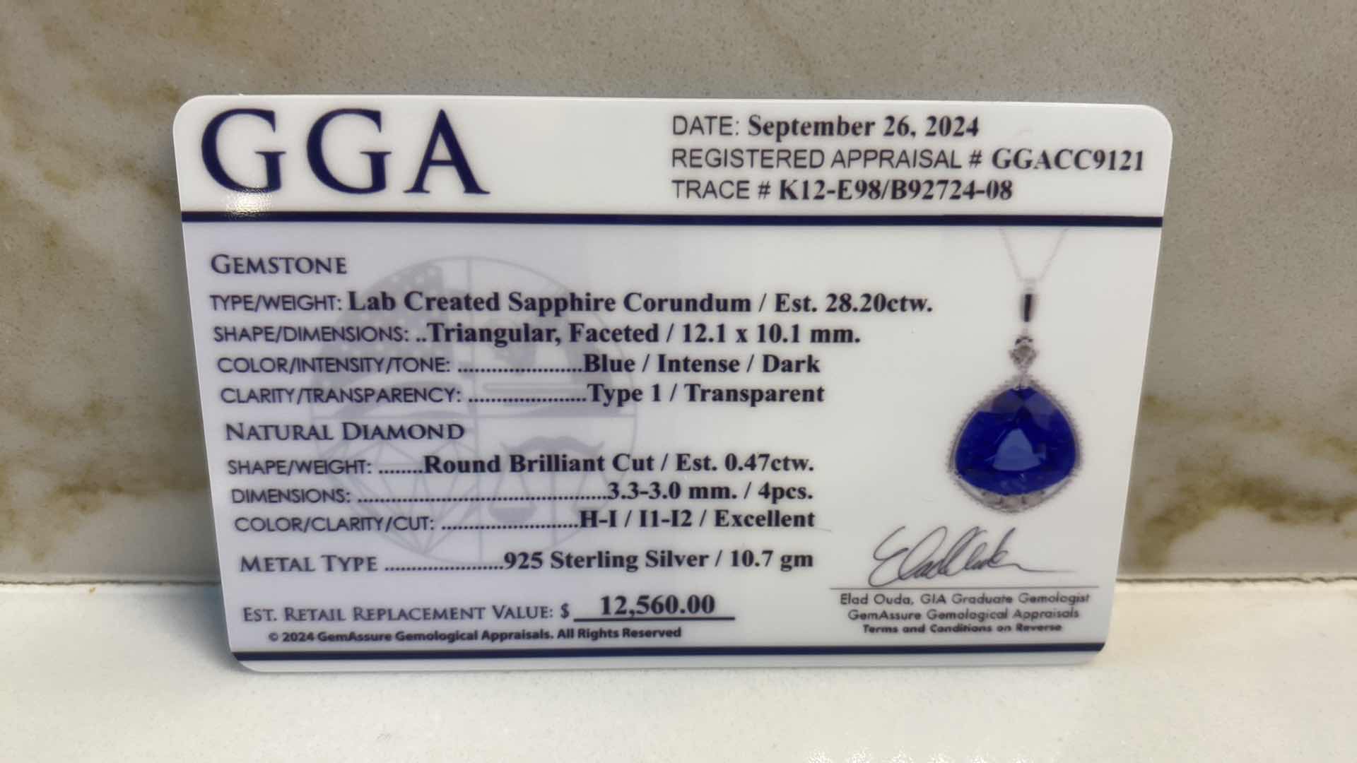 Photo 1 of 925 STERLING SILVER 10.7 gm PENDANT NECKLACE W/LAB CREATED SAPPHIRE EST 28.20 ctw & NATURAL DIAMOND EST. .47 ctw GGA APPRAISAL K12E98