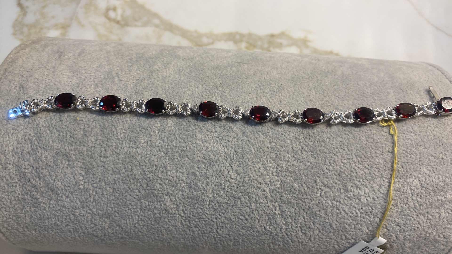 Photo 1 of 925 STERLING SILVER 16.4 gm BRACELET W/GARNET OVAL EST 17.18 ctw & NATURAL DIAMOND EST .38 ctw GGA APPRAISAL K81E2
