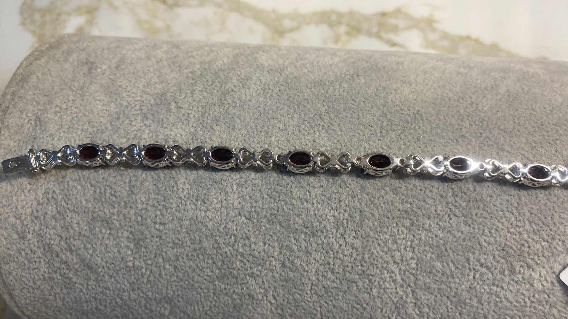 Photo 1 of 925 STERLING SILVER 16.4 gm BRACELET W/GARNET OVAL EST 17.18 ctw & NATURAL DIAMOND EST .38 ctw GGA APPRAISAL K81E2