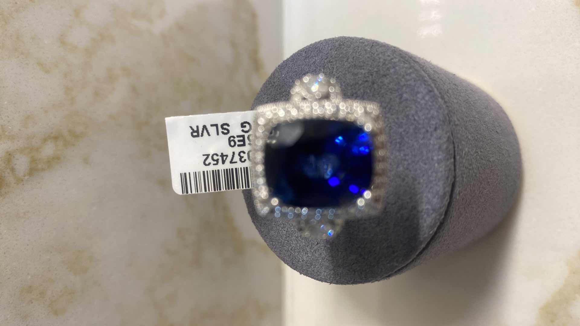 Photo 1 of 925 STERLING SILVER RING 6.3 gm W/ LAB CREATED SAPPHIRE CORUNDUM EST 8.23 ctw  CUSHION CUT W/NATURAL DIAMOND ROUND  EST .20 ctw SIZE 6.75 GGA CERTIFIED APPRAISAL K56E9