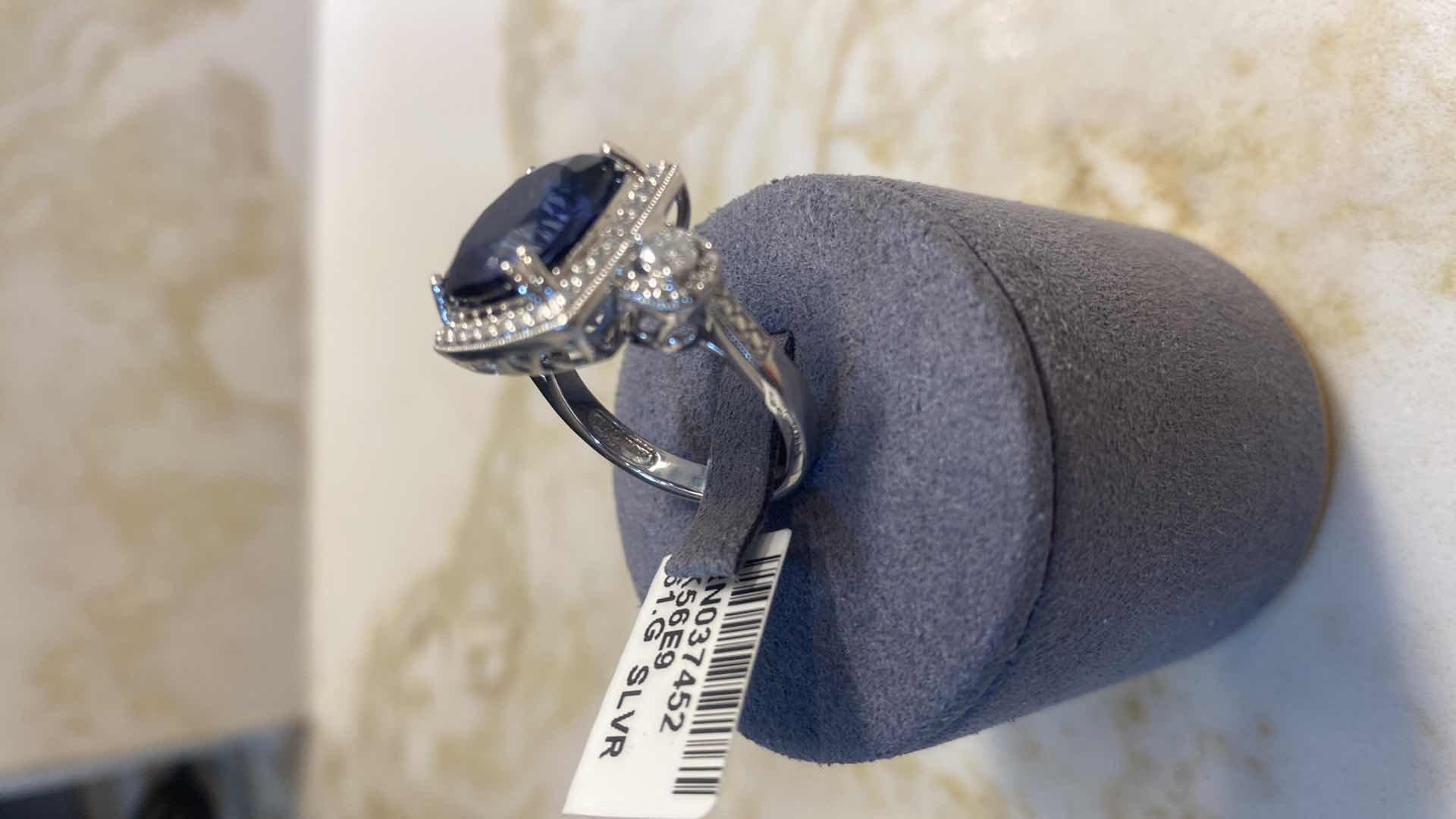 Photo 1 of 925 STERLING SILVER RING 6.3 gm W/ LAB CREATED SAPPHIRE CORUNDUM EST 8.23 ctw  CUSHION CUT W/NATURAL DIAMOND ROUND  EST .20 ctw SIZE 6.75 GGA CERTIFIED APPRAISAL K56E9