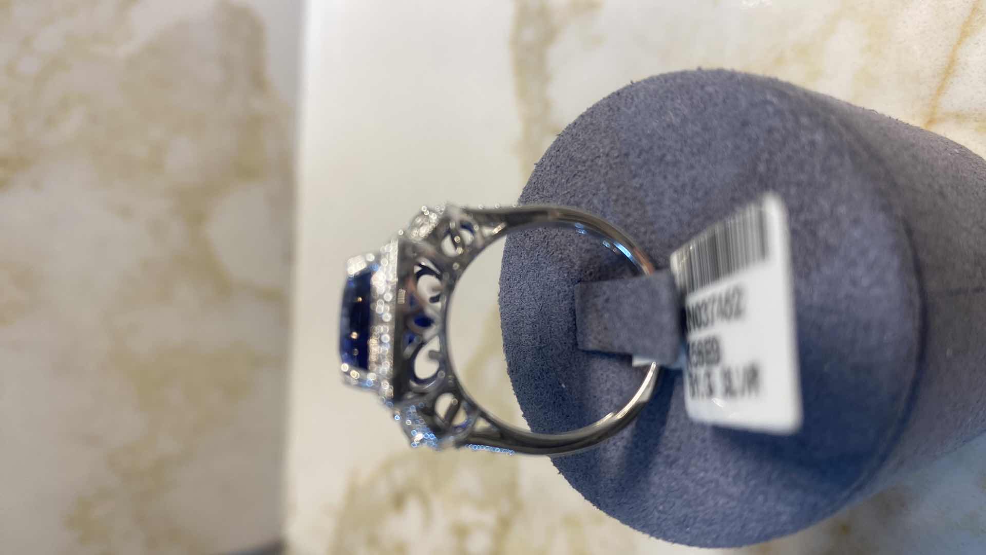 Photo 1 of 925 STERLING SILVER RING 6.3 gm W/ LAB CREATED SAPPHIRE CORUNDUM EST 8.23 ctw  CUSHION CUT W/NATURAL DIAMOND ROUND  EST .20 ctw SIZE 6.75 GGA CERTIFIED APPRAISAL K56E9