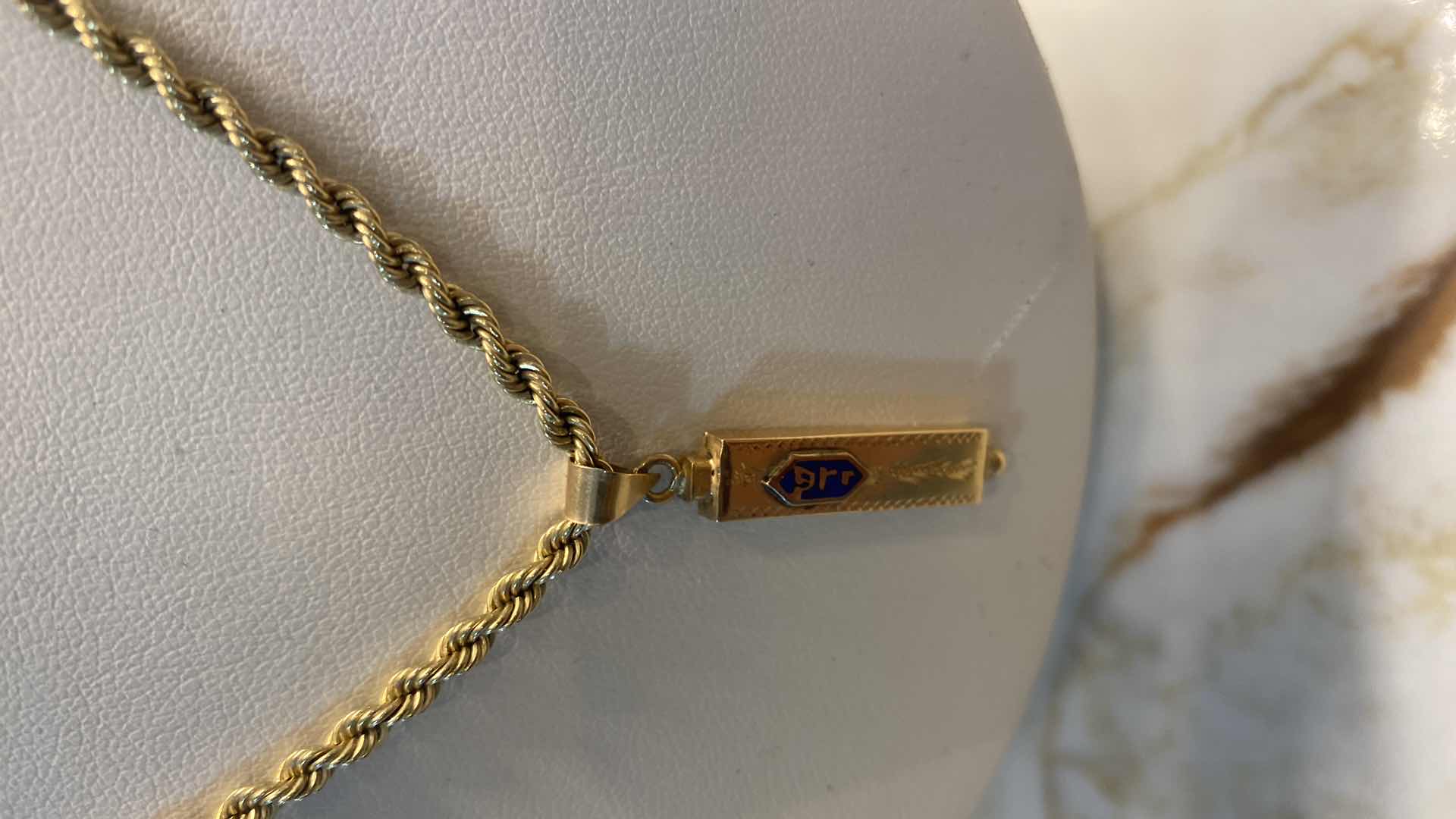 Photo 1 of UNMARKED 18” SILVER CHAIN (gold color) 9.9 GRAMS WITH PENDANT