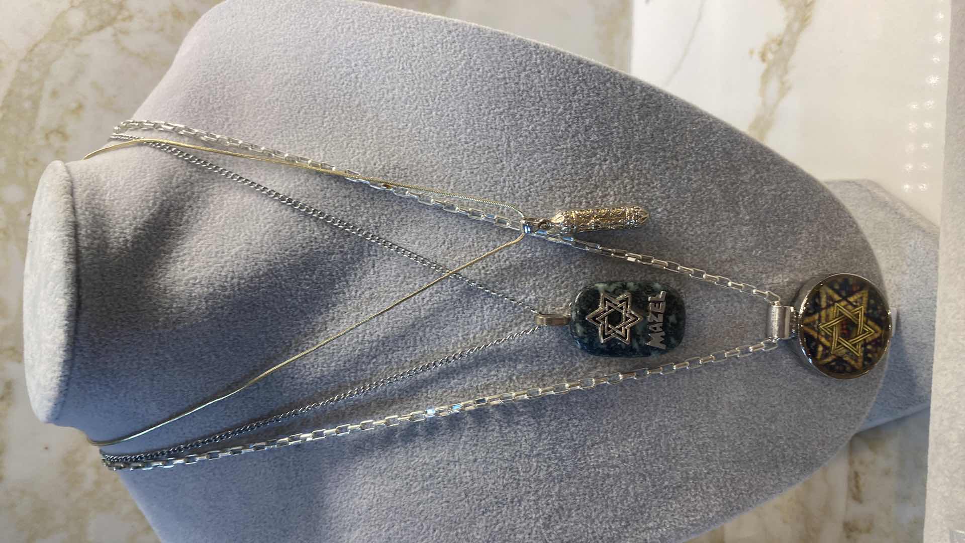 Photo 1 of COSTUME JEWELRY- 3 NECKLACES, COIN & CLIP