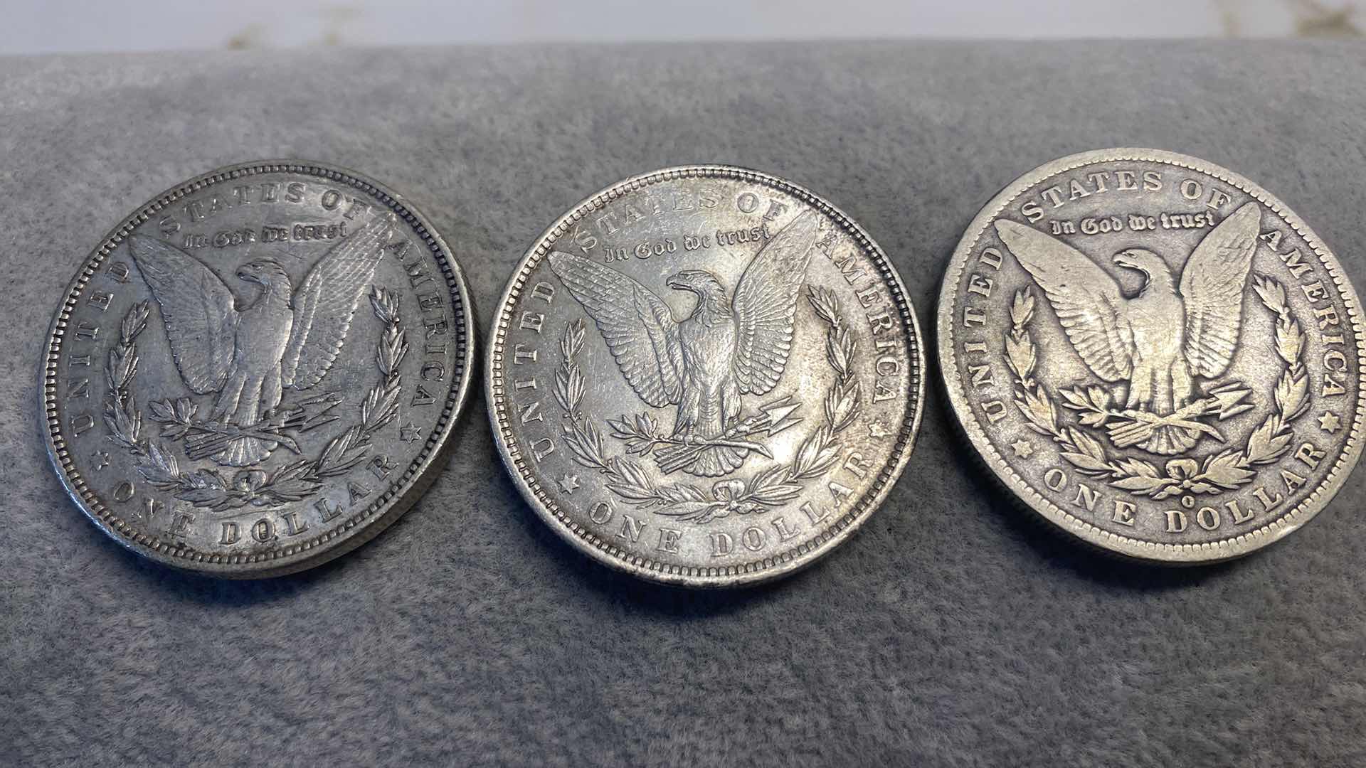 Photo 1 of 3-SILVER MORGAN DOLLARS FROM THE 1800’s INCLUDES PLASTIC CONTAINER