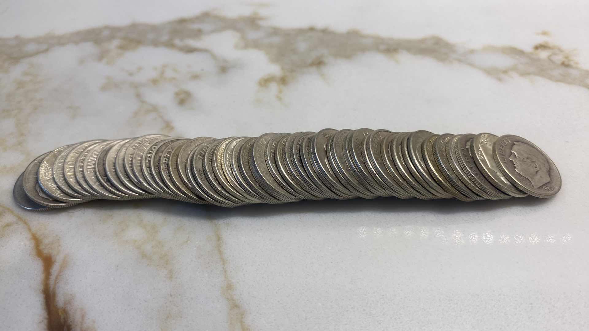 Photo 1 of 49- 90% SILVER DIMES IN TUBE FROM MID 1900’s