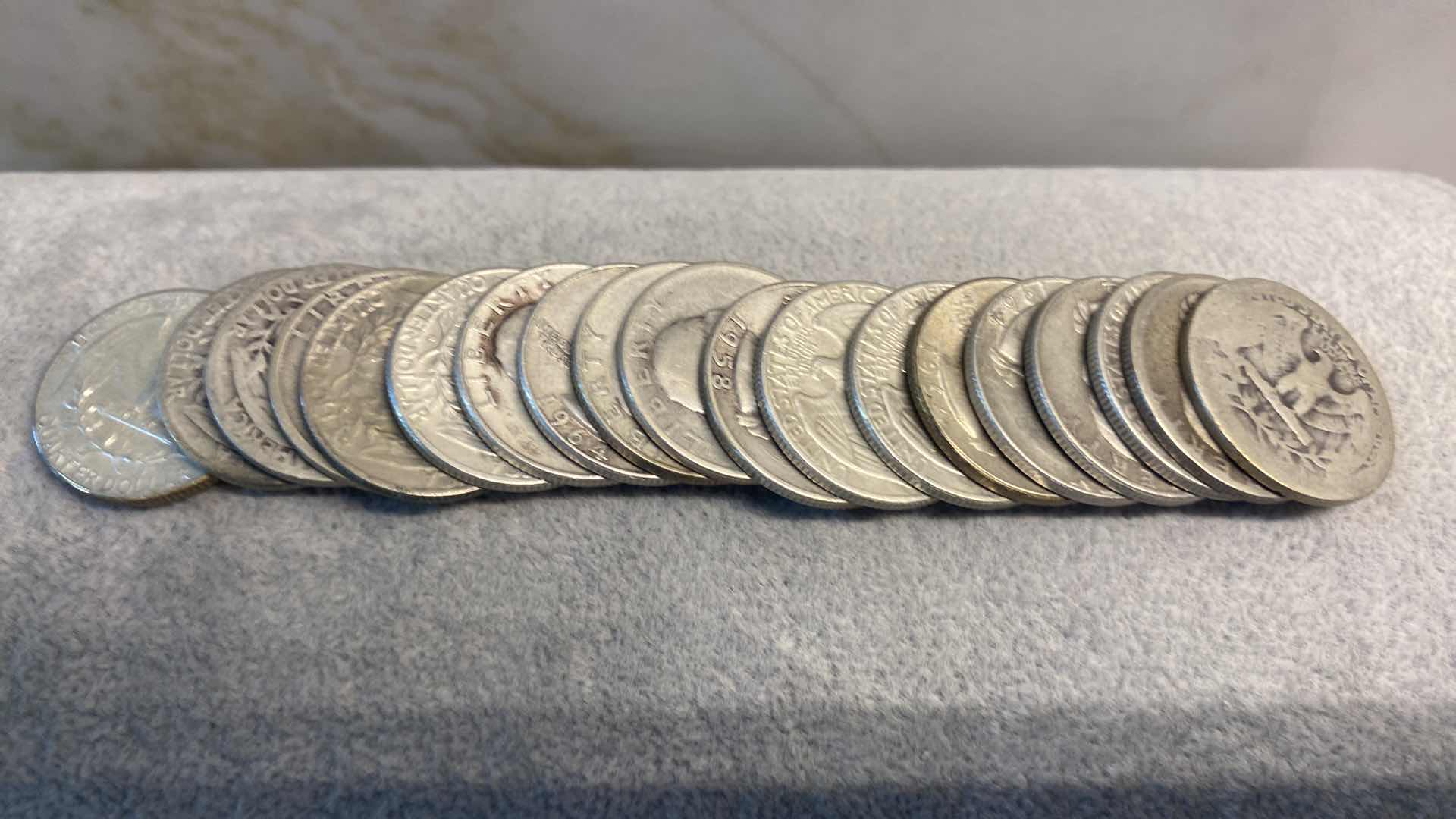 Photo 1 of 19-90% SILVER QUARTERS FROM 1900’s (VARIOUS YEARS) TUBE INCLUDED