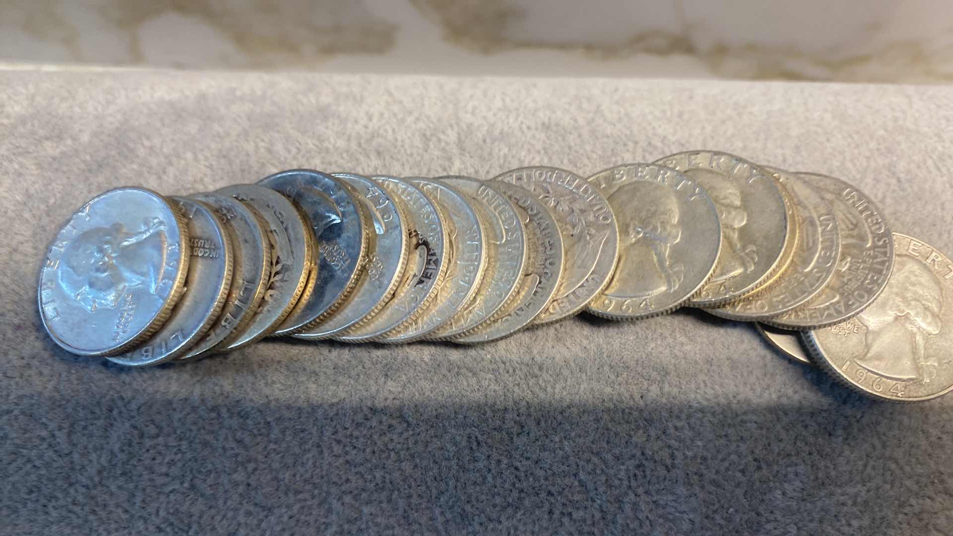 Photo 1 of 19-90% SILVER QUARTERS FROM 1900’s (VARIOUS YEARS) TUBE INCLUDED